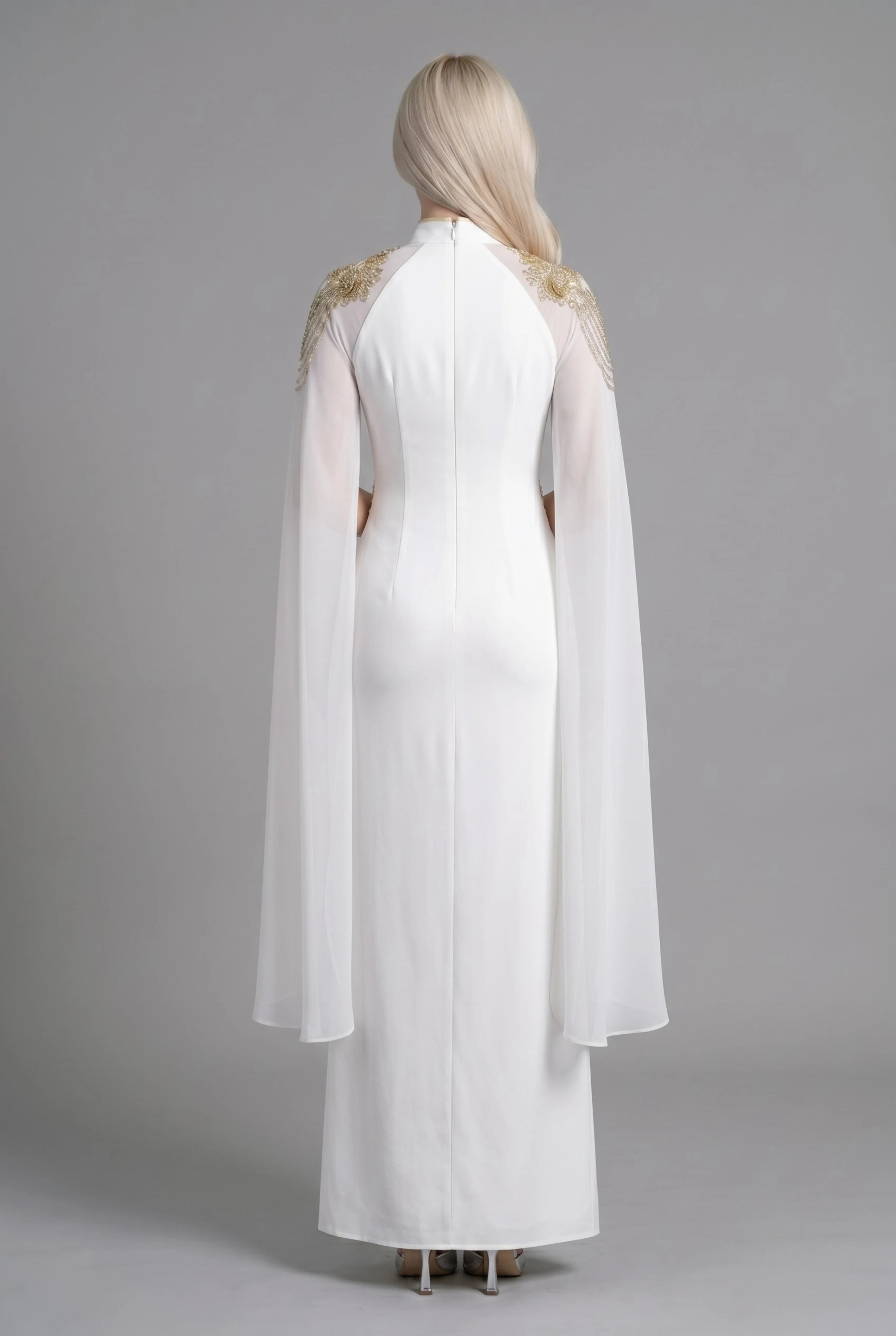Full-length back view of the white fusion dress showing the long draped cape elements and tailored floor-length silhouette