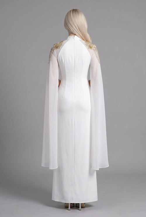 Full-length back view of the white fusion dress showing the long draped cape elements and tailored floor-length silhouette