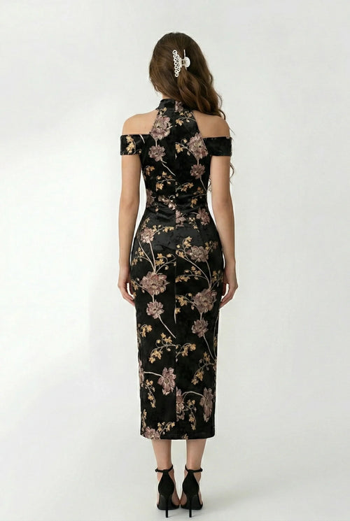 Fitted back view of a black floral halter-style qipao