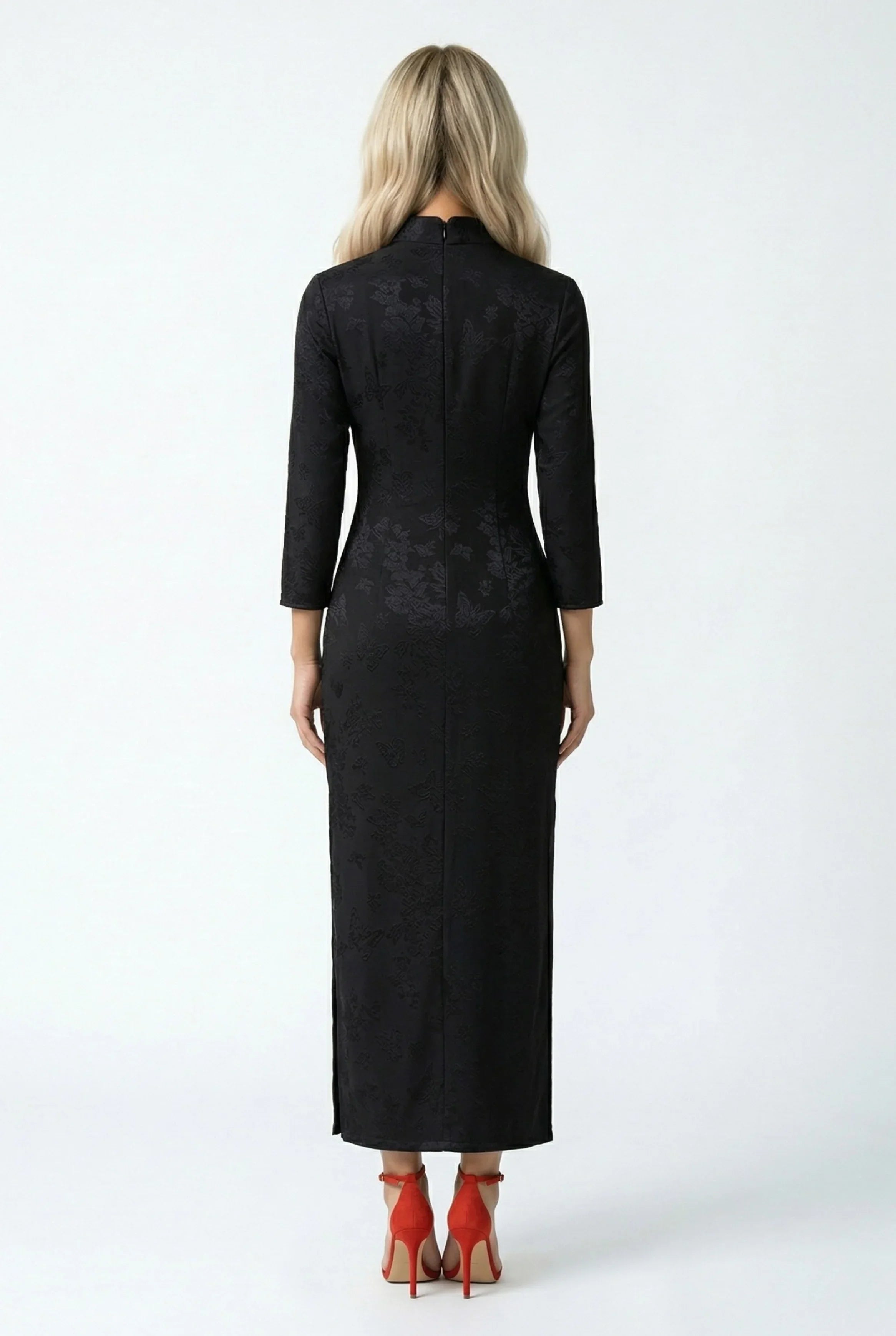 Back full view of the long black qipao, showing its silhouette.