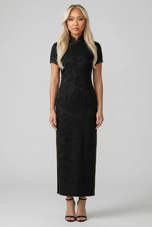 Full-length front view of an elegant black silk Qipao dress with a mandarin collar and gold-trimmed closures