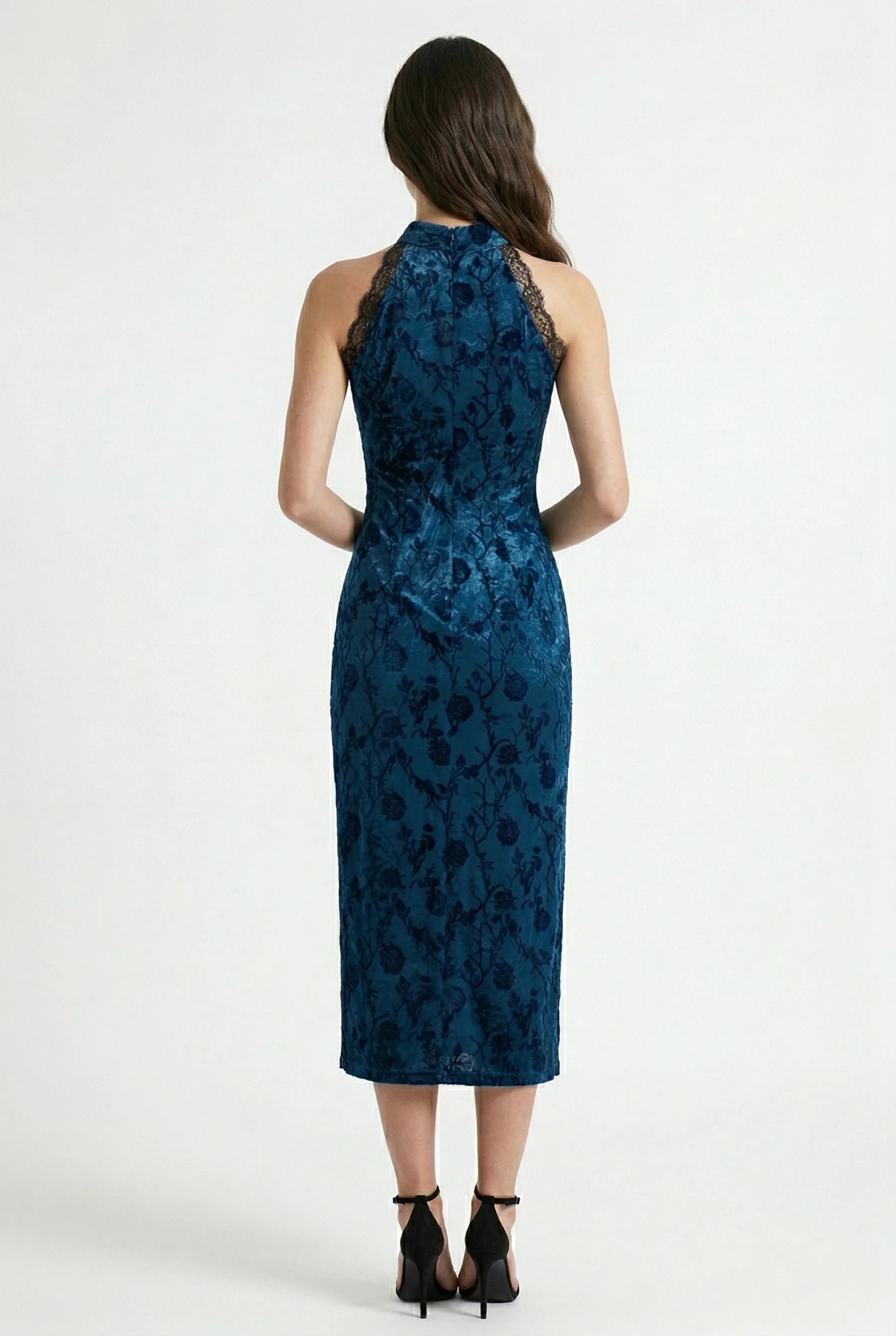 Back view of the blue velvet cheongsam showing the slim fit.