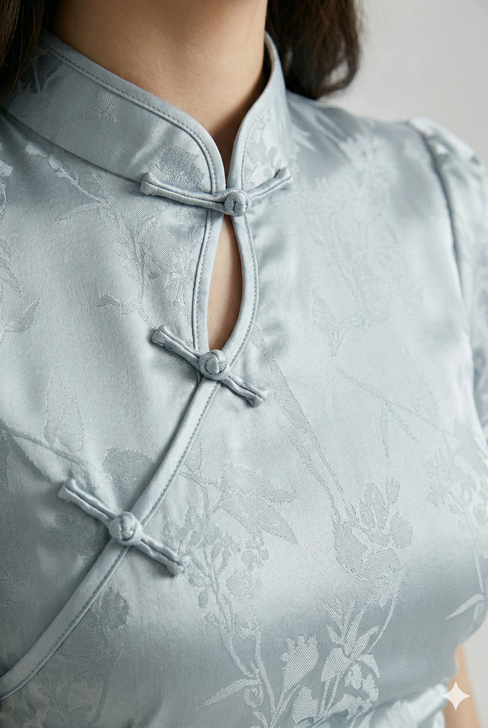 Maison Hua blue qipao detail, mandarin collar and side buttons
