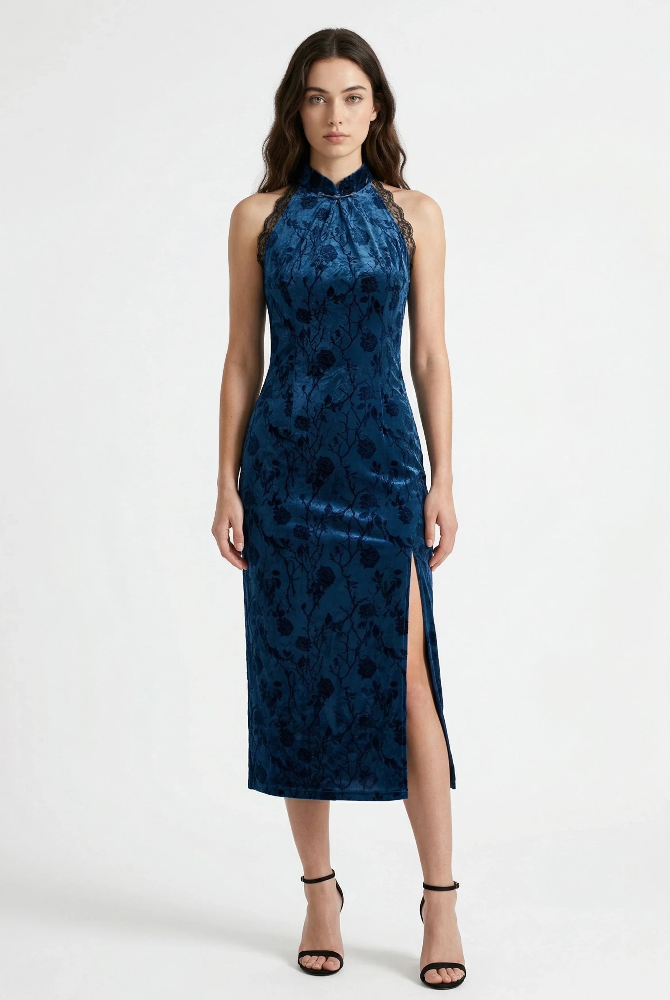 Front view of a blue velvet qipao dress with a high slit.
