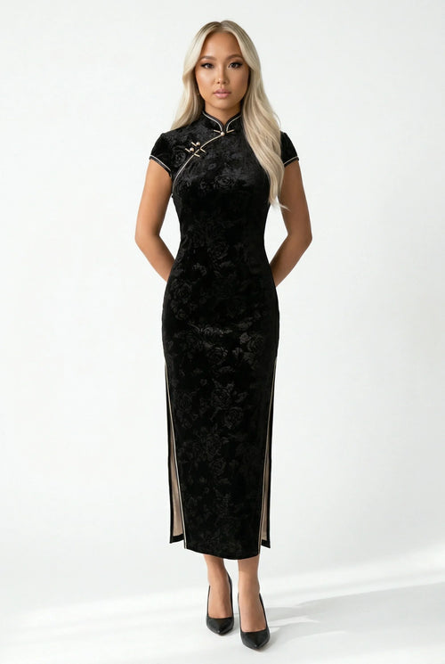 Front view of a black velvet cheongsam with a subtle floral pattern.