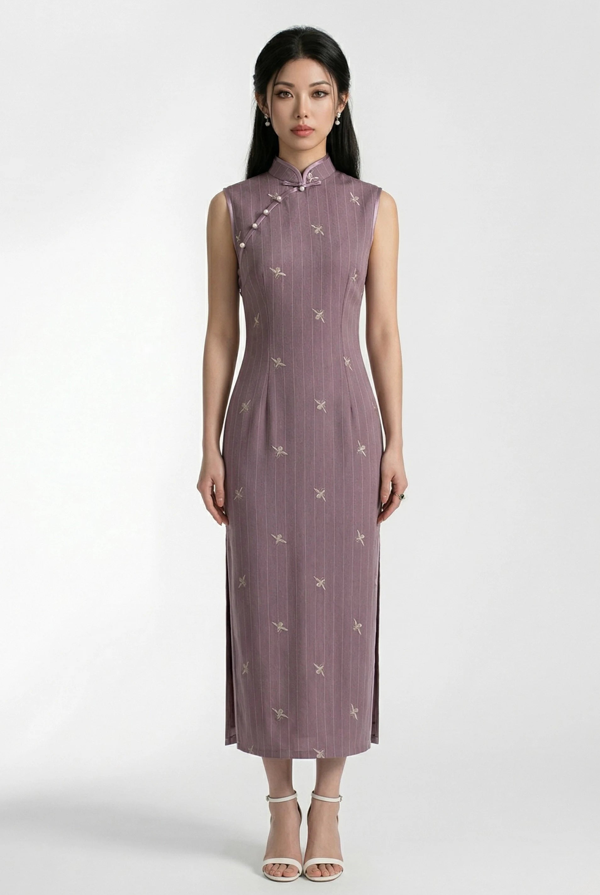 Front view of a sleeveless Chinese style purple dress with a slim silhouette and delicate gold embroidery.