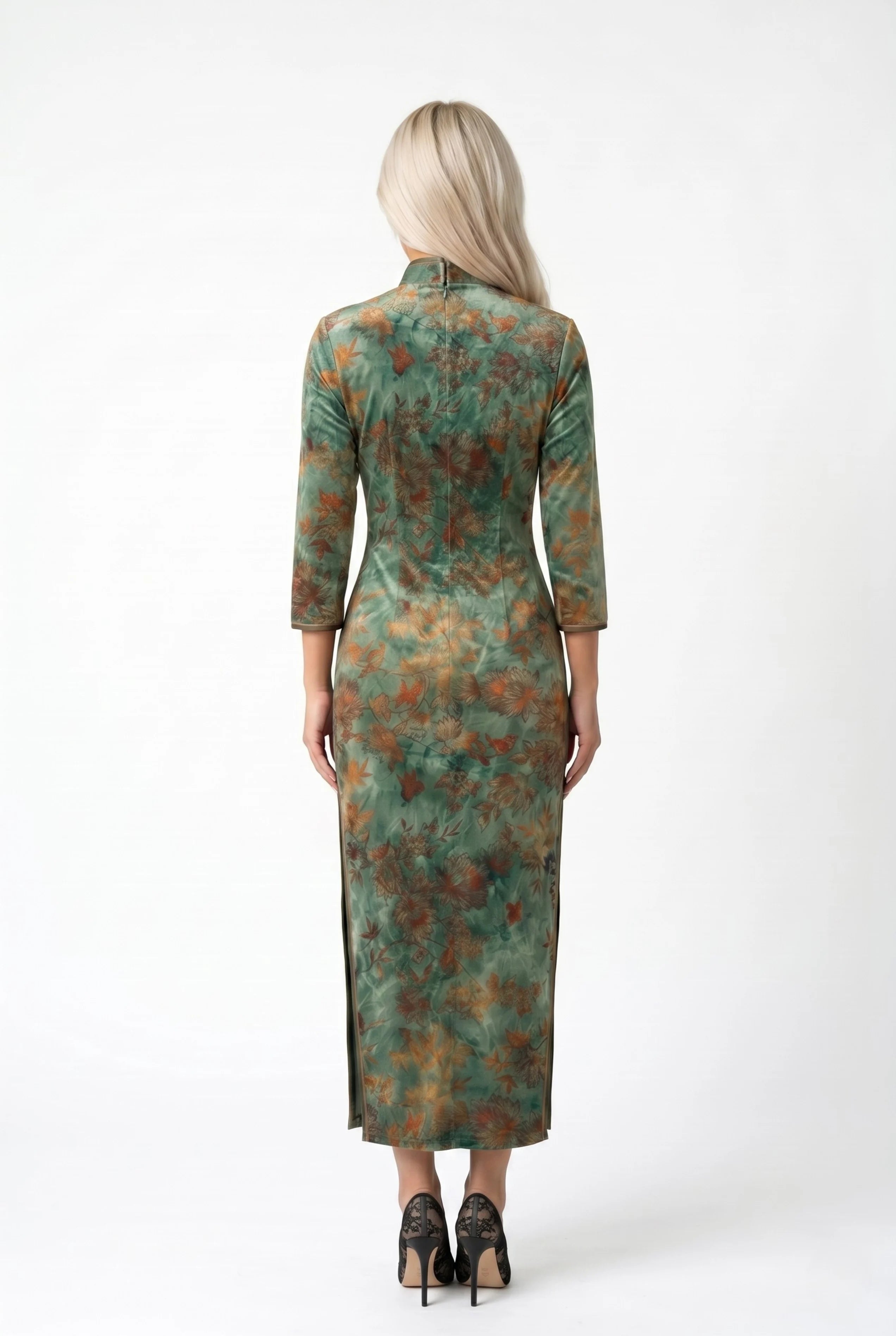 Full-length back view of the vintage green velvet qipao dress showing the tailored midi silhouette