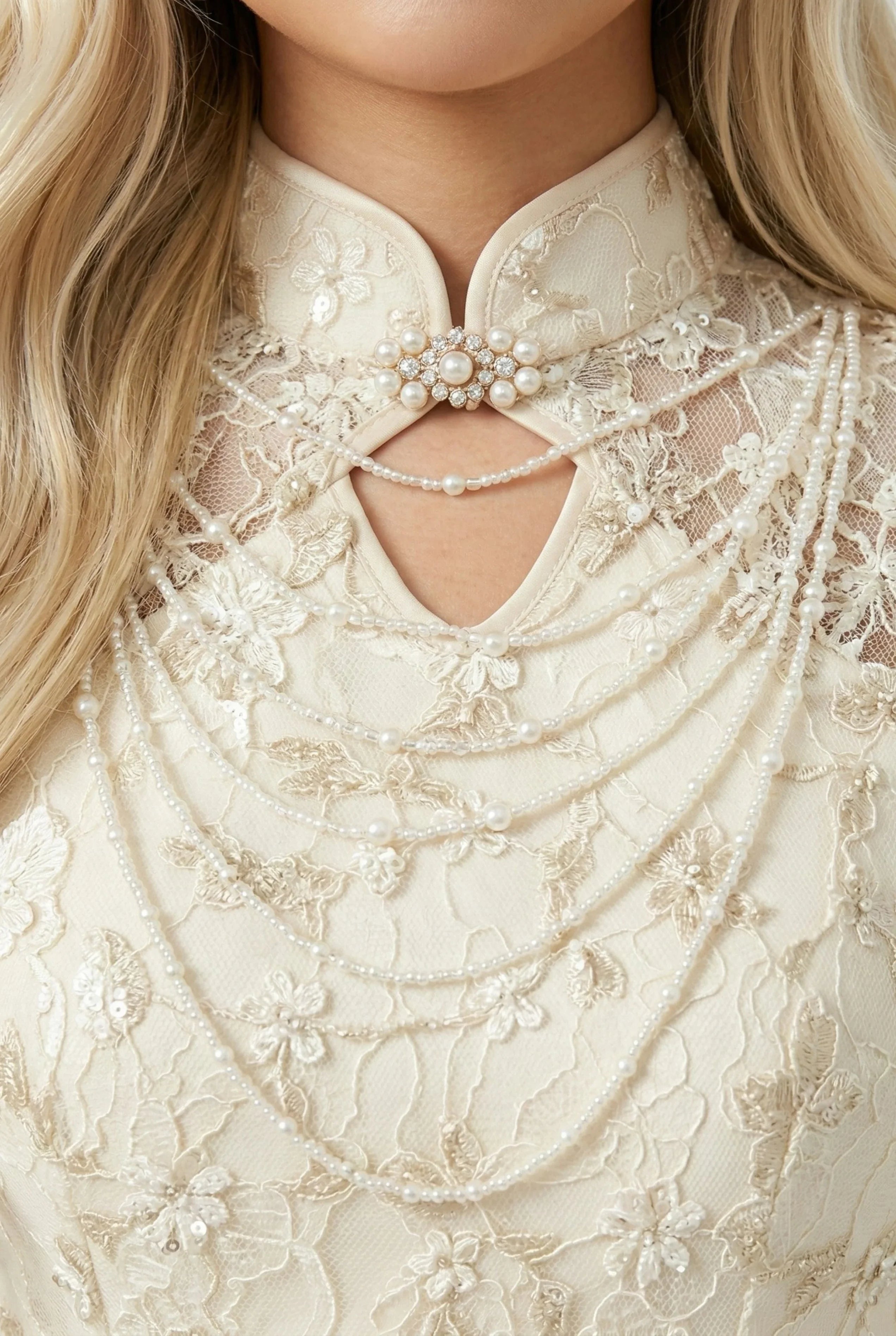 Maison Hua cream qipao detail, mandarin collar with pearl chains