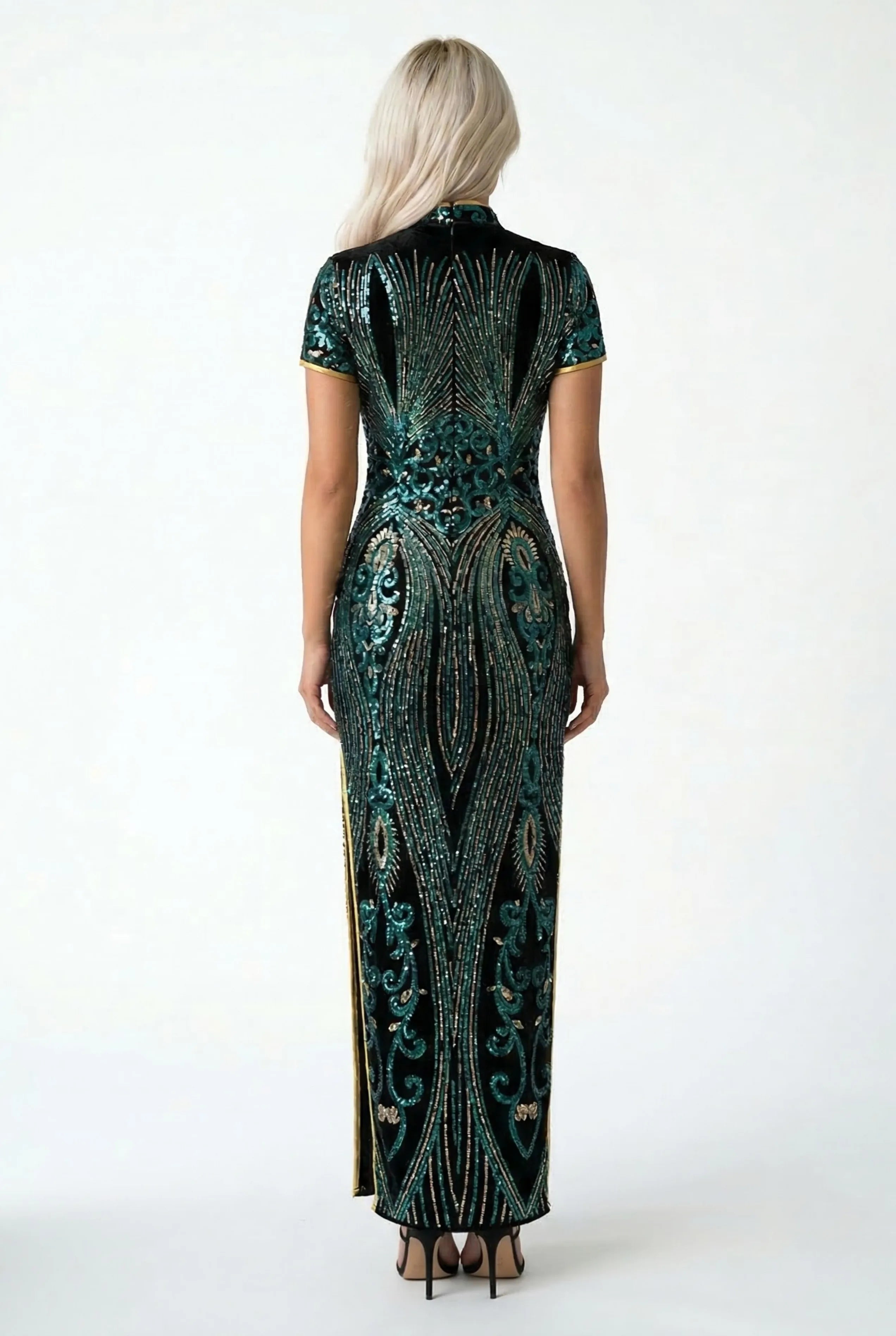 Three-quarter back view of a form-fitting dark green midi Cheongsam dress on a model.