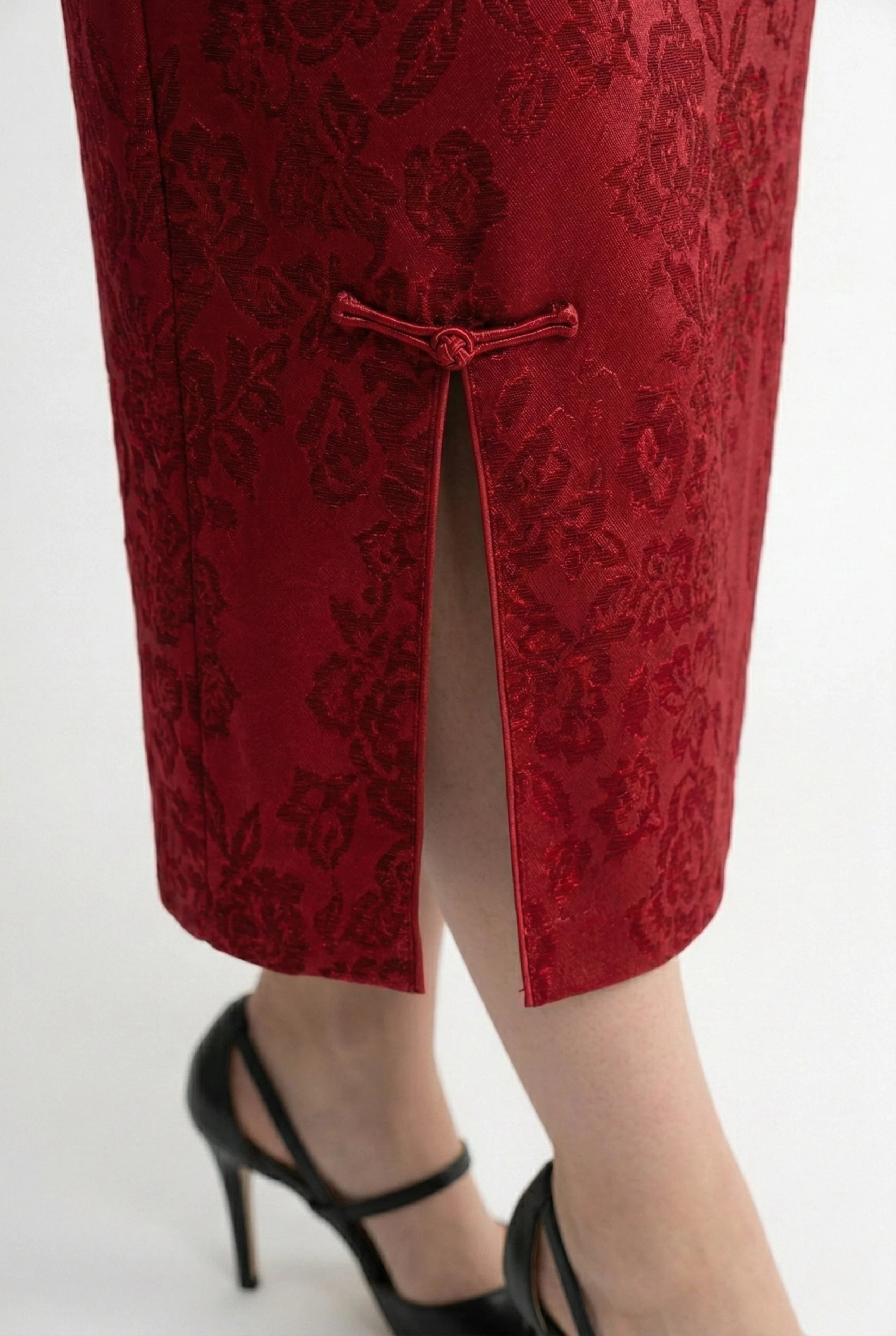Maison Hua dark red qipao, side slit and traditional button detail