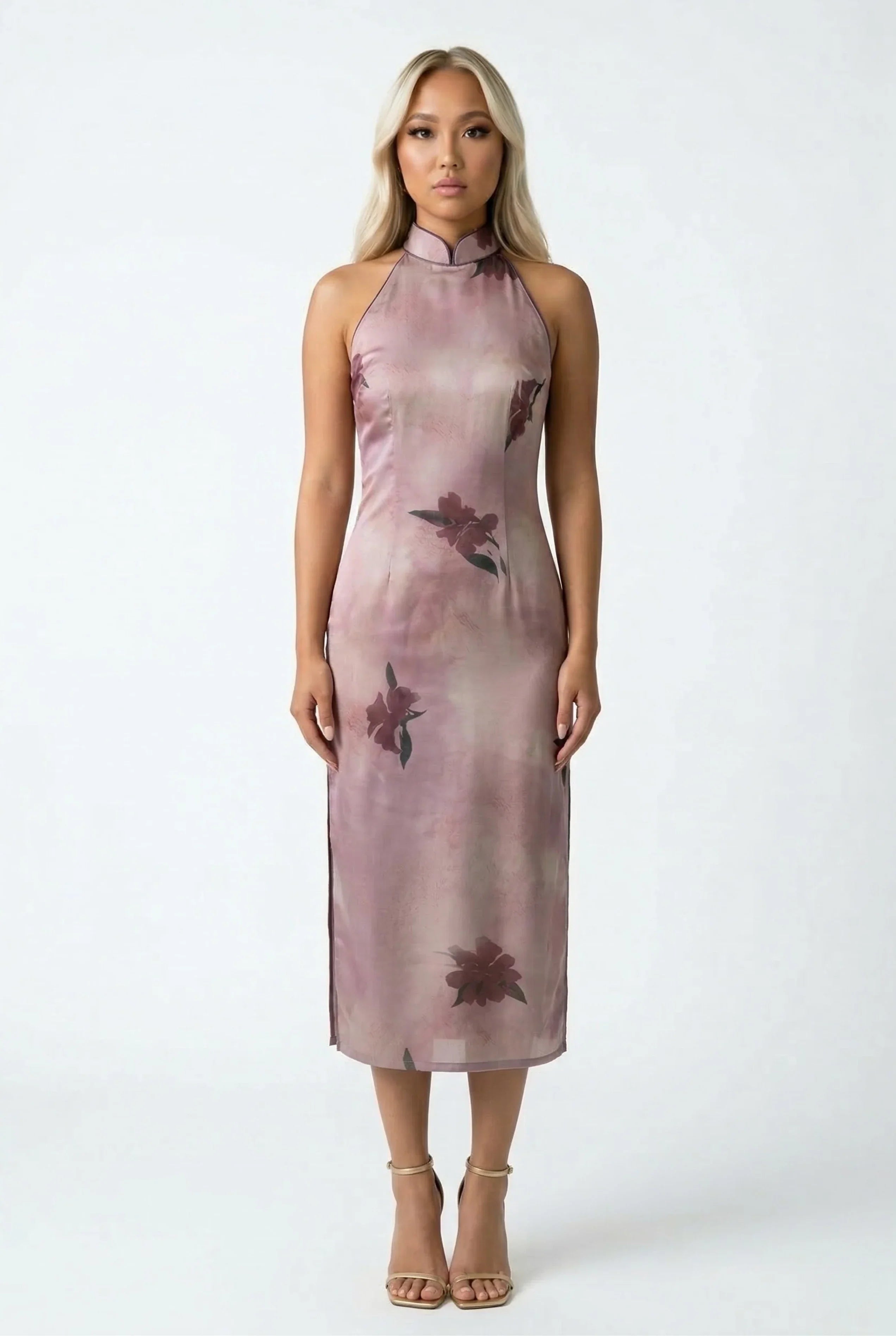 Full-length front view of an elegant dusty rose silk-style Qipao with a halter neck and large muted floral patterns.