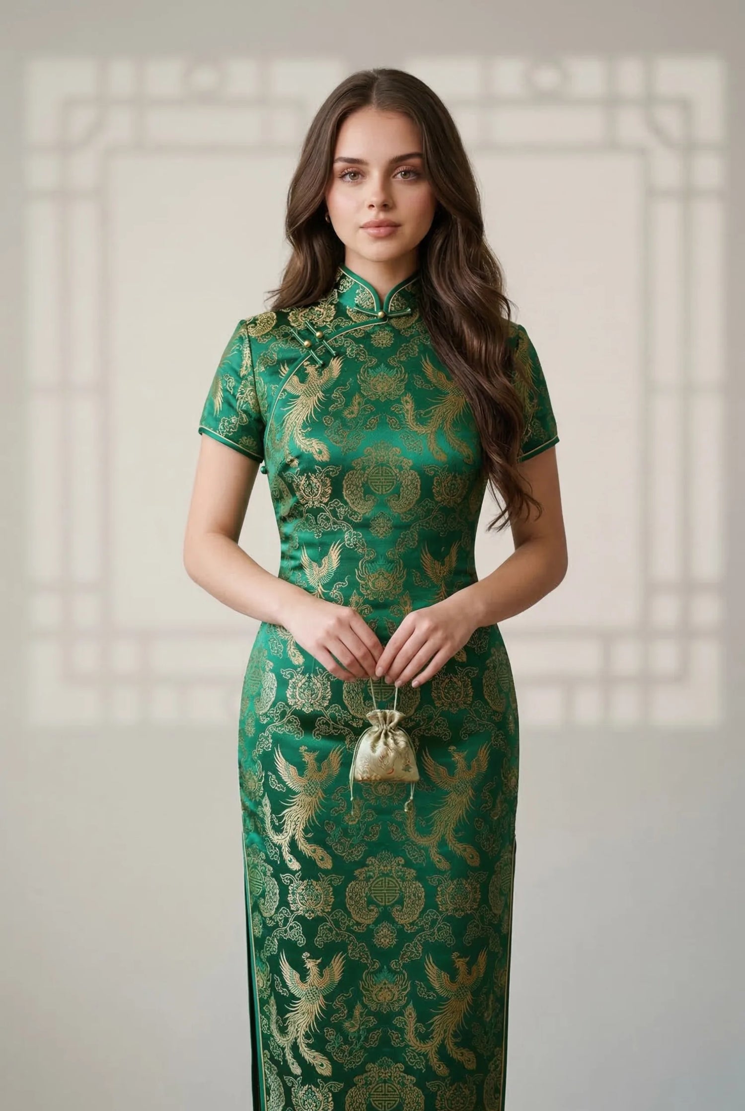 Emerald green silk brocade qipao by Maison Hua, featuring intricate gold dragon motifs and a structured long-line silhouette, showcasing precise tailoring for non-stretch heritage textiles