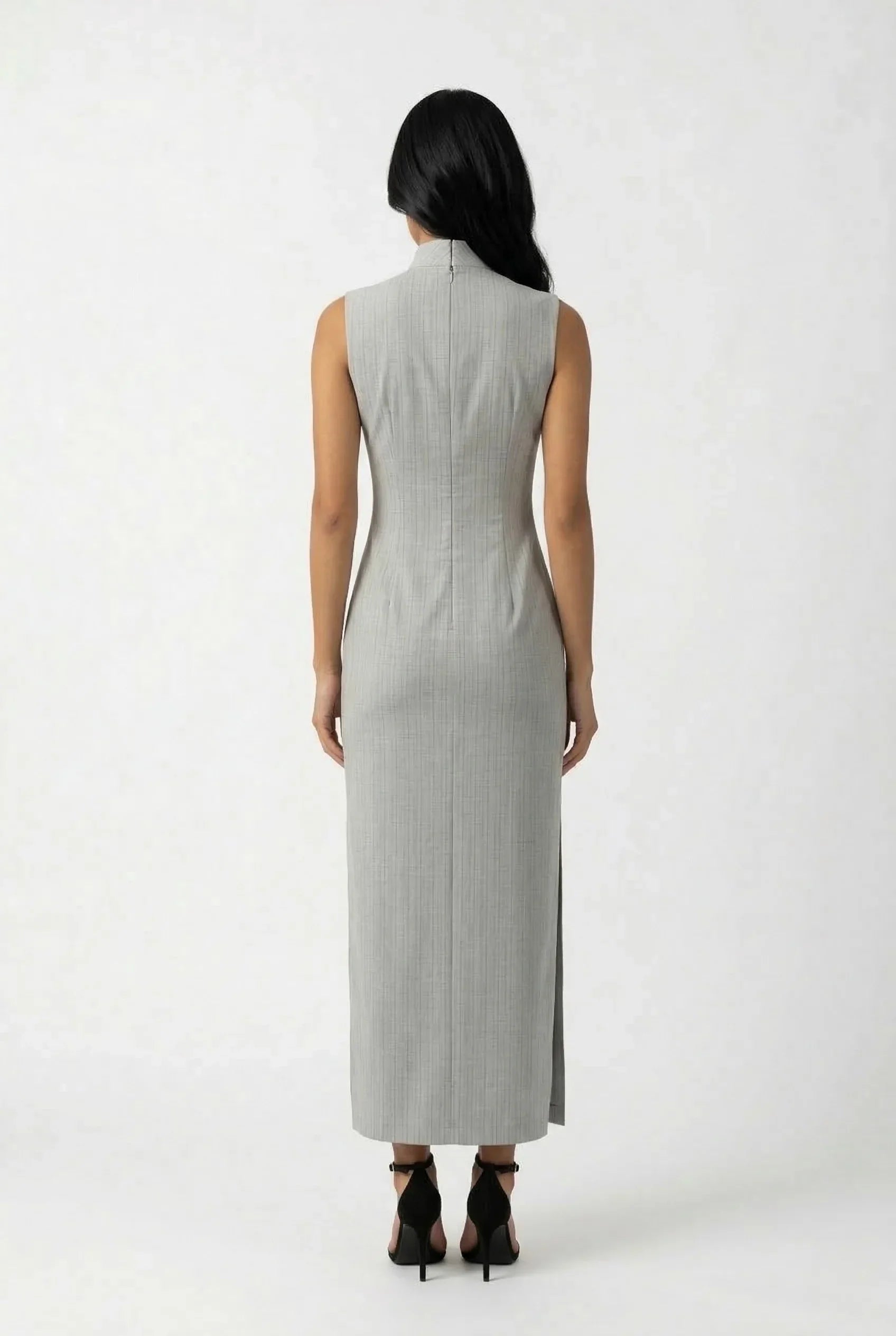 Back view of a minimalist grey long Cheongsam showing the sleek form-fitting silhouette and ankle-length cut.