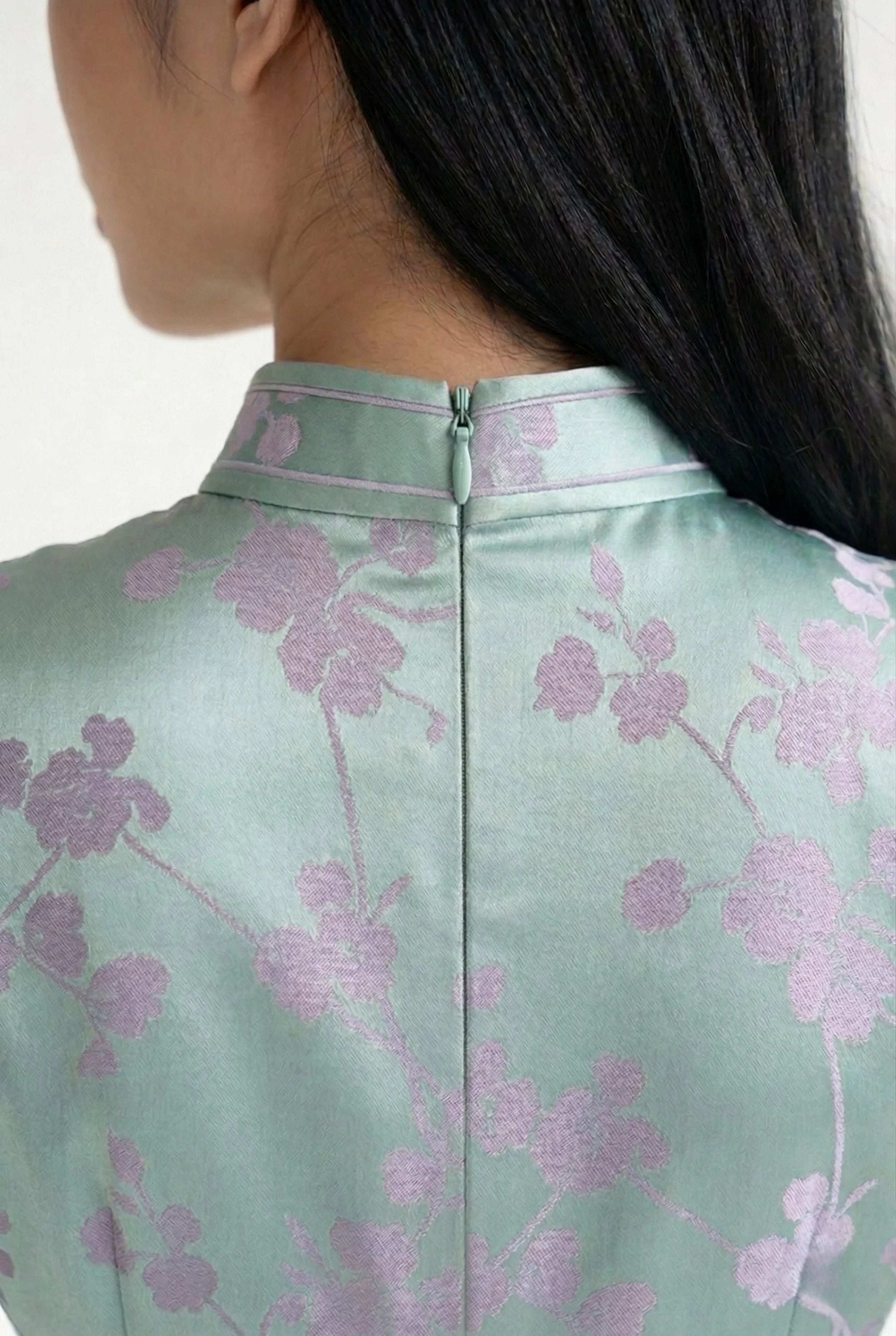 Close-up of the lavender floral jacquard pattern and rear collar.