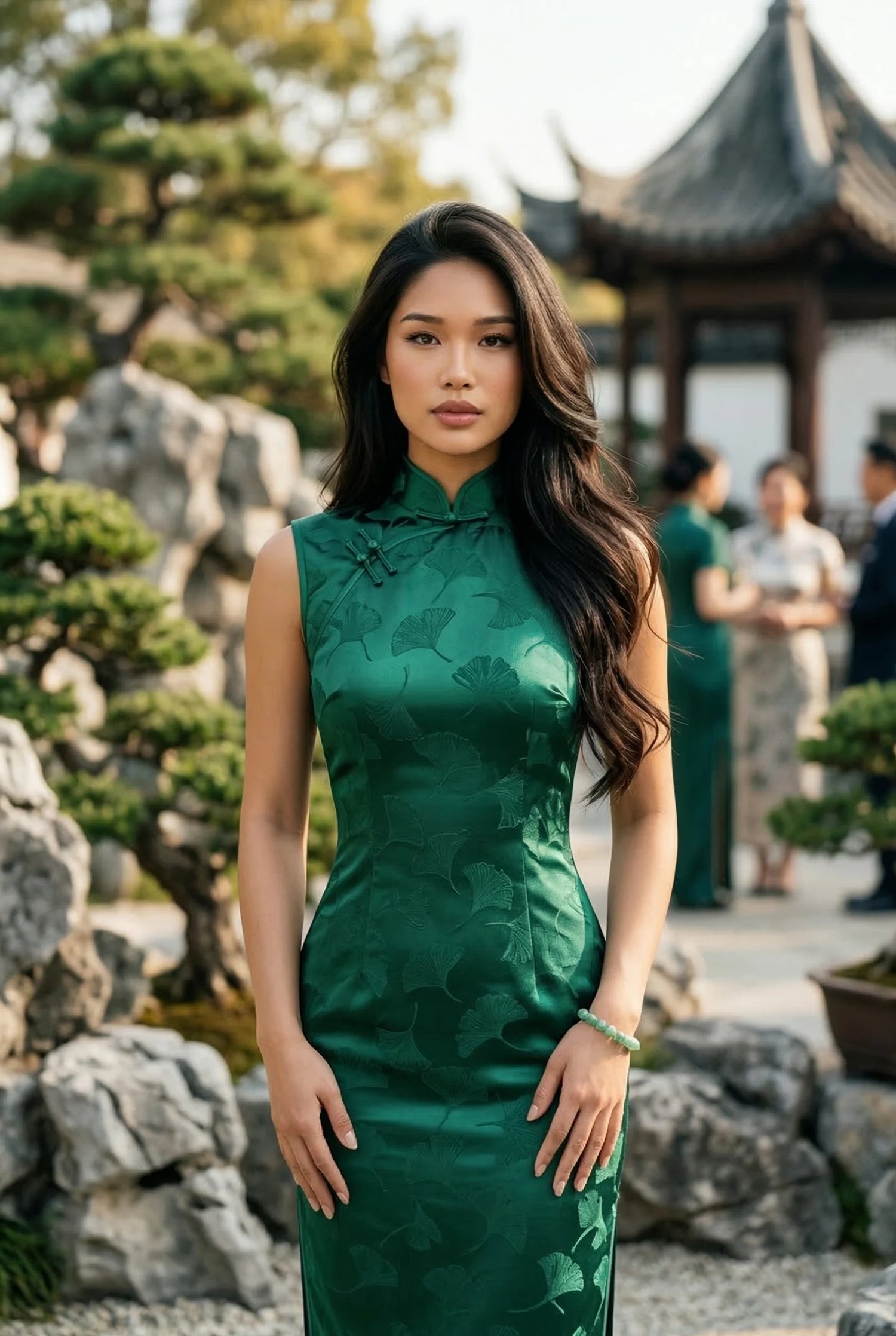 Sleeveless jade green silk qipao by Maison Hua featuring a subtle ginkgo leaf pattern, demonstrating a high-density fabric finish for a structured, professional silhouette