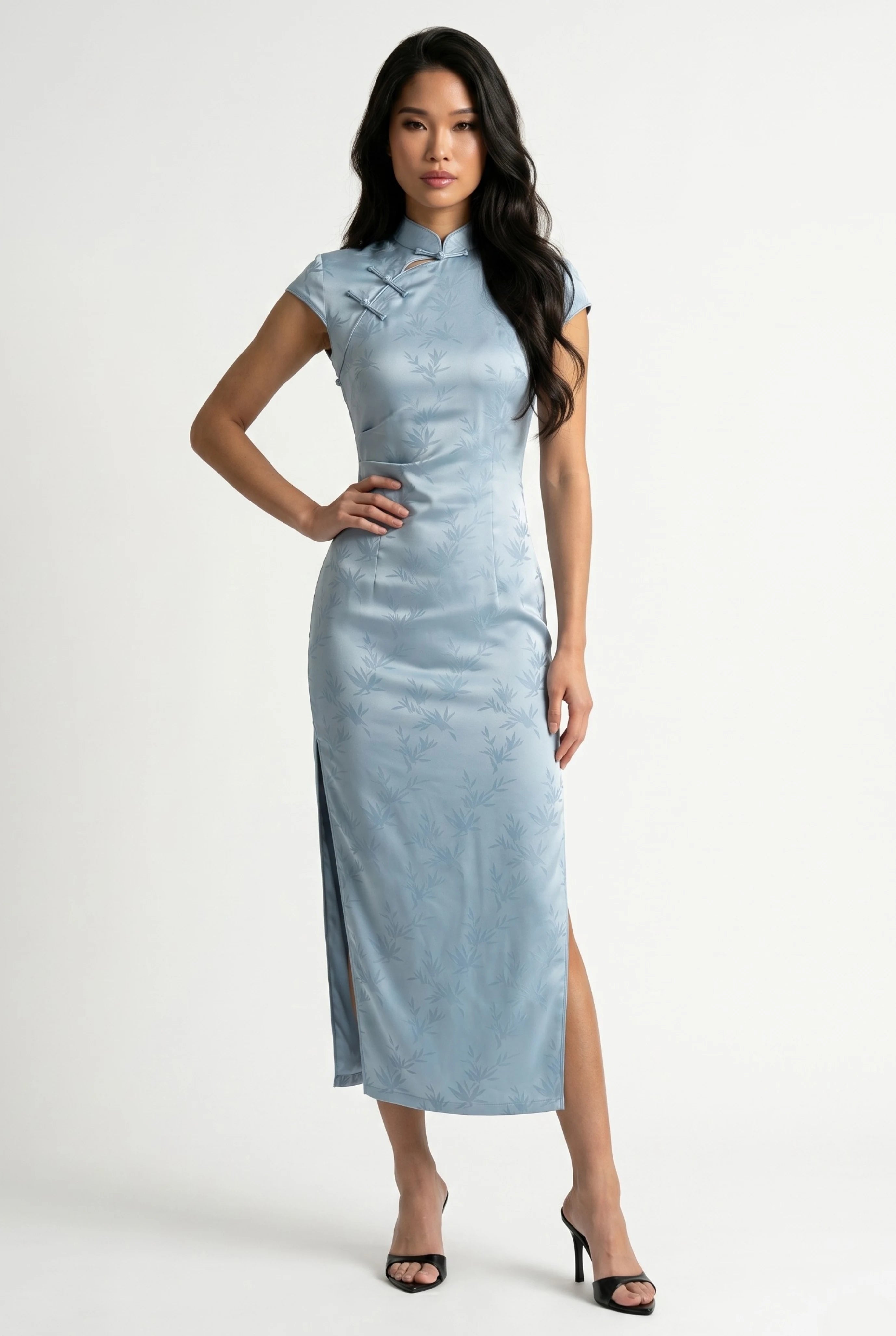 Front full-length view of a light blue satin cheongsam dress featuring subtle jacquard patterns and black heels