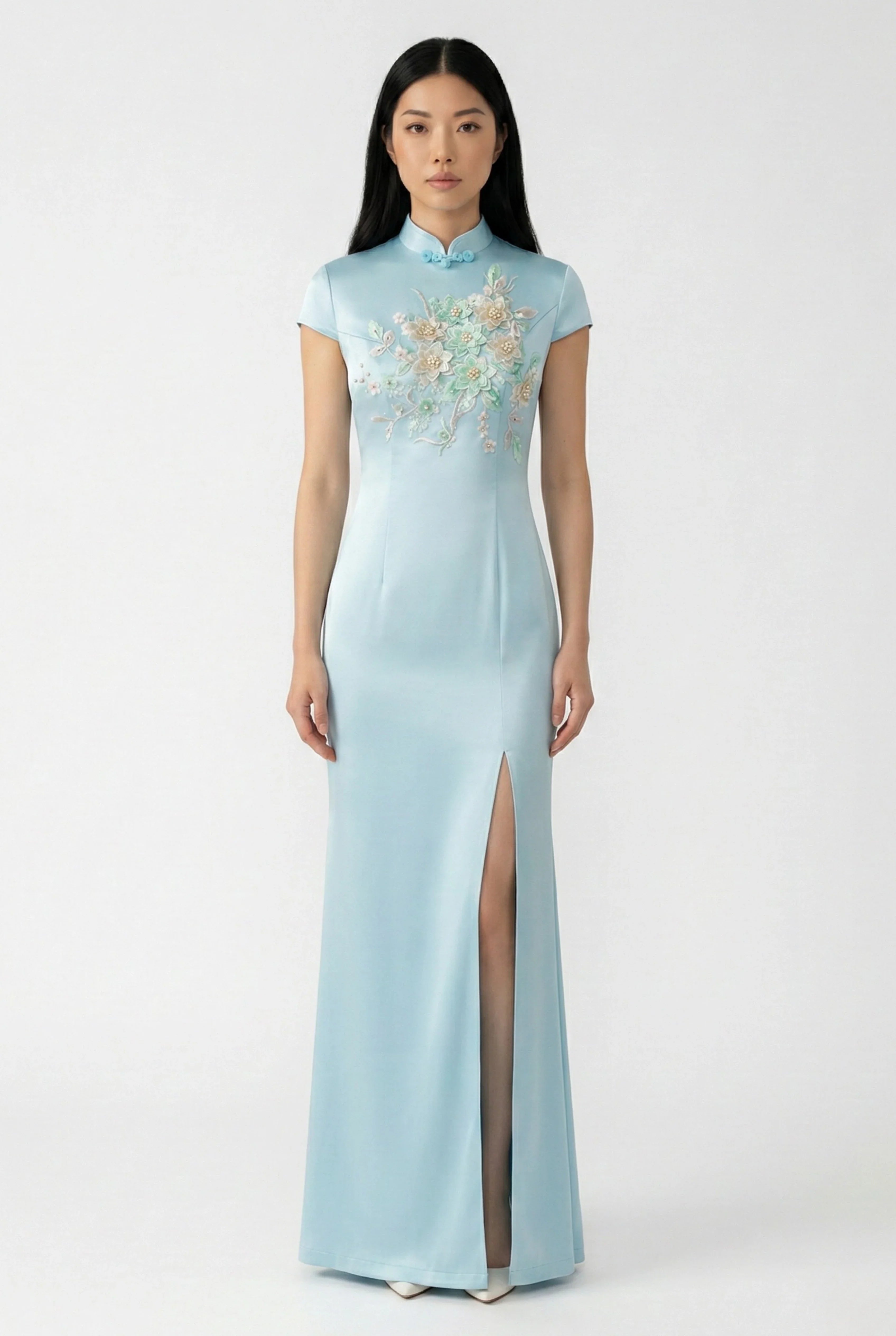 Maison Hua light blue silk qipao with floral embroidery, front view.