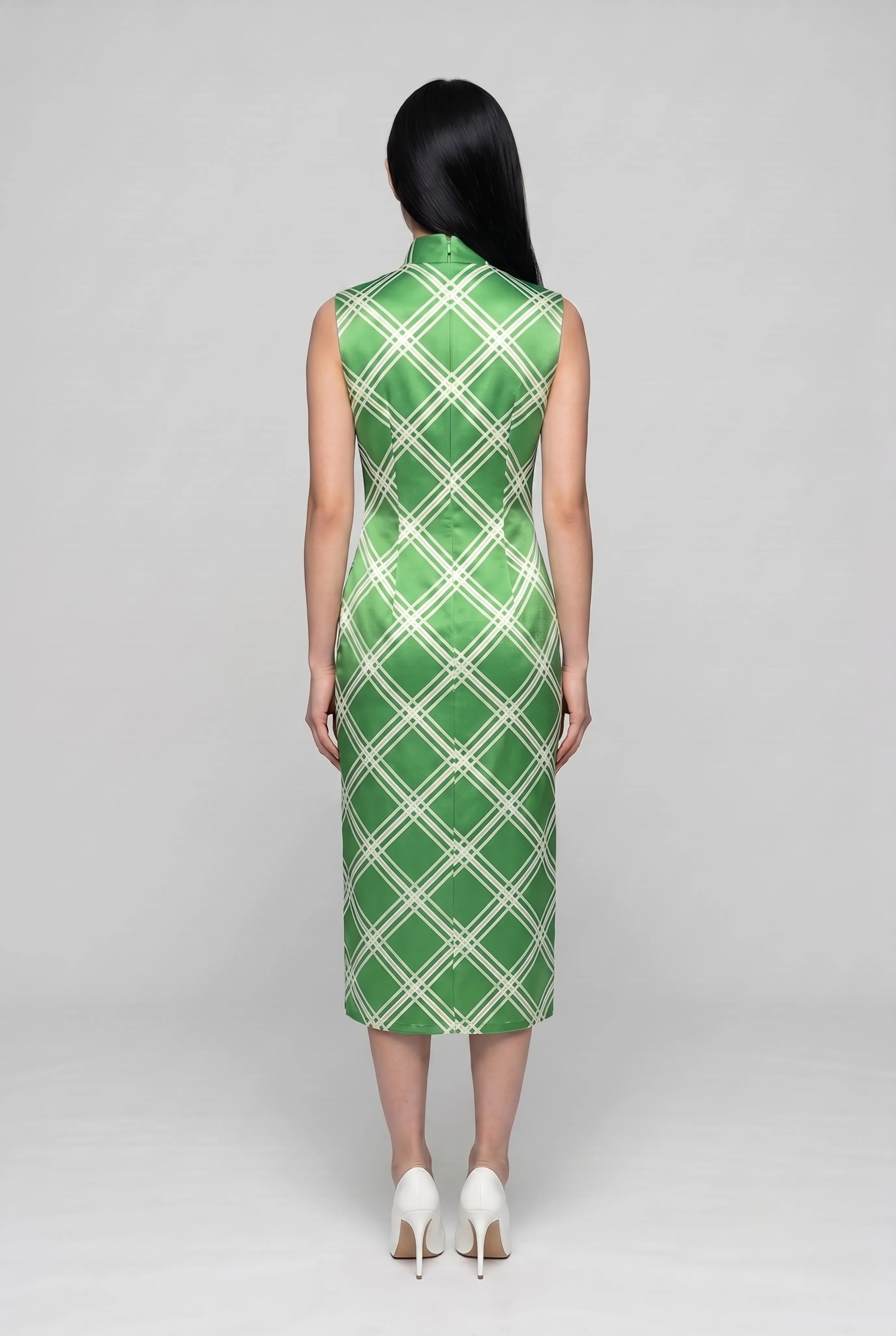 Full-length back view of the lime green diamond pattern qipao dress showing the sleek tailored midi silhouette