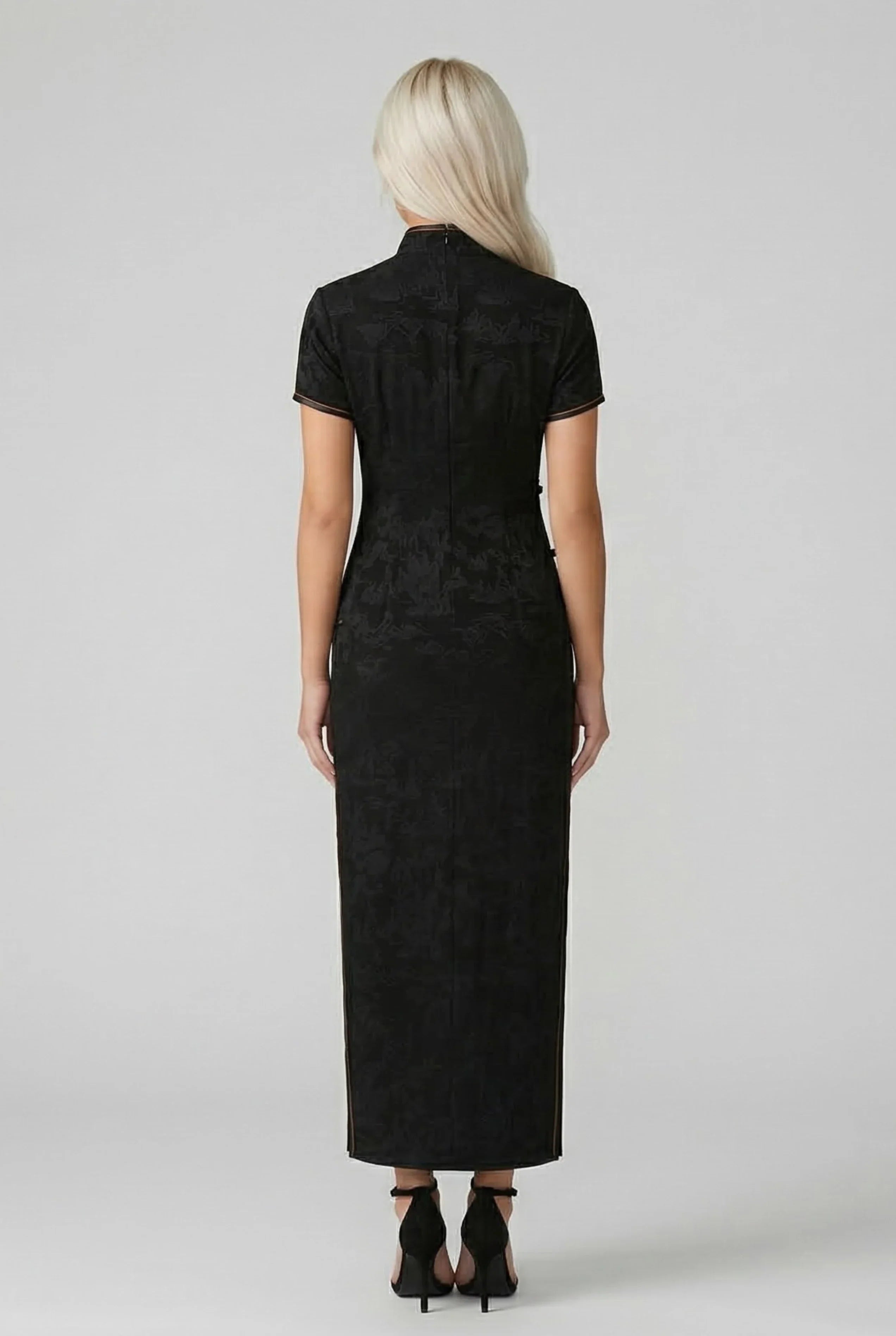 Back view of a long, form-fitting black Cheongsam dress showing the silhouette and ankle-length cut.