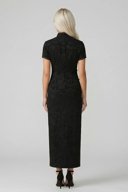 Back view of a long, form-fitting black Cheongsam dress showing the silhouette and ankle-length cut.