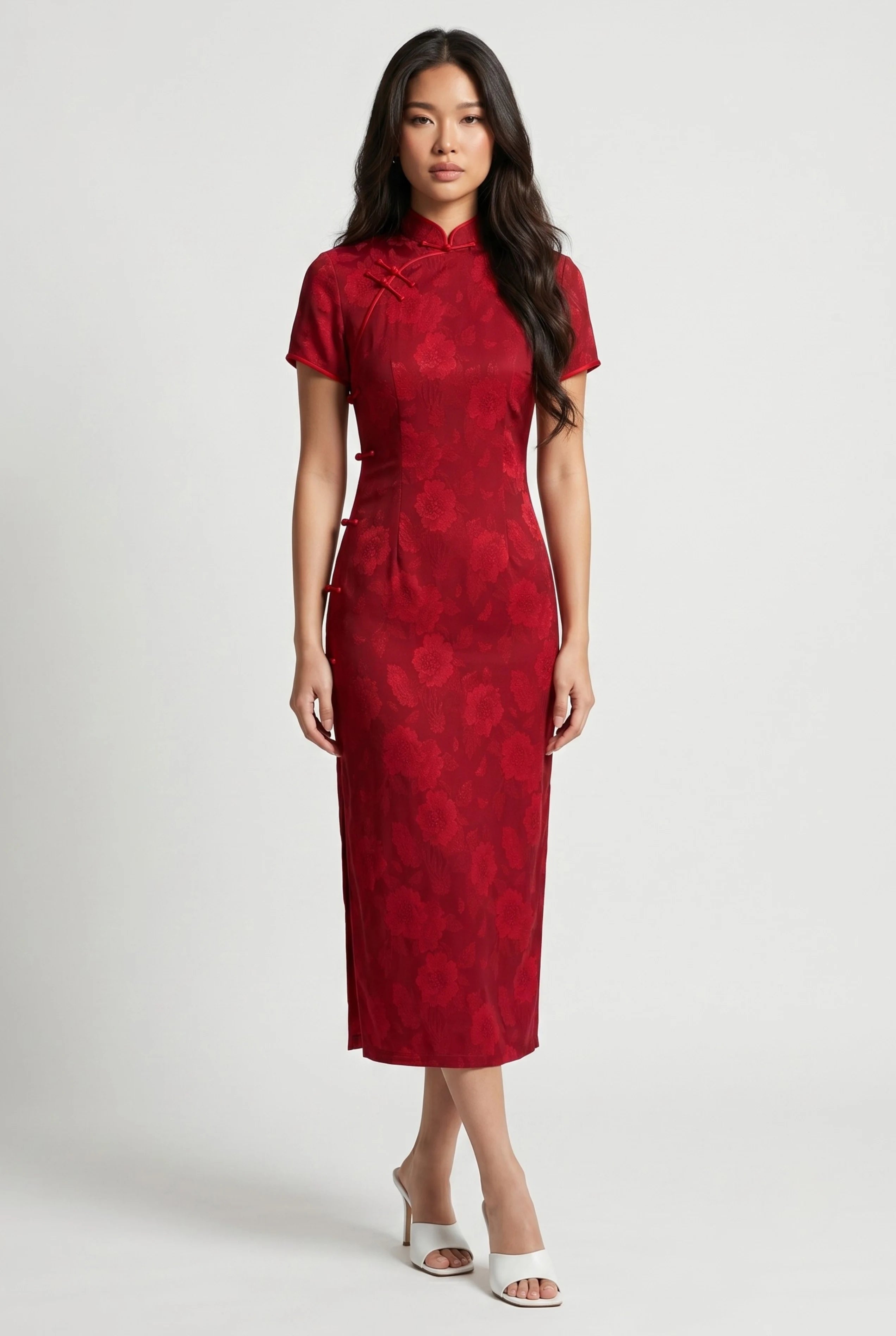 Front full-length view of a long red cheongsam dress featuring a floral jacquard pattern and short sleeves
