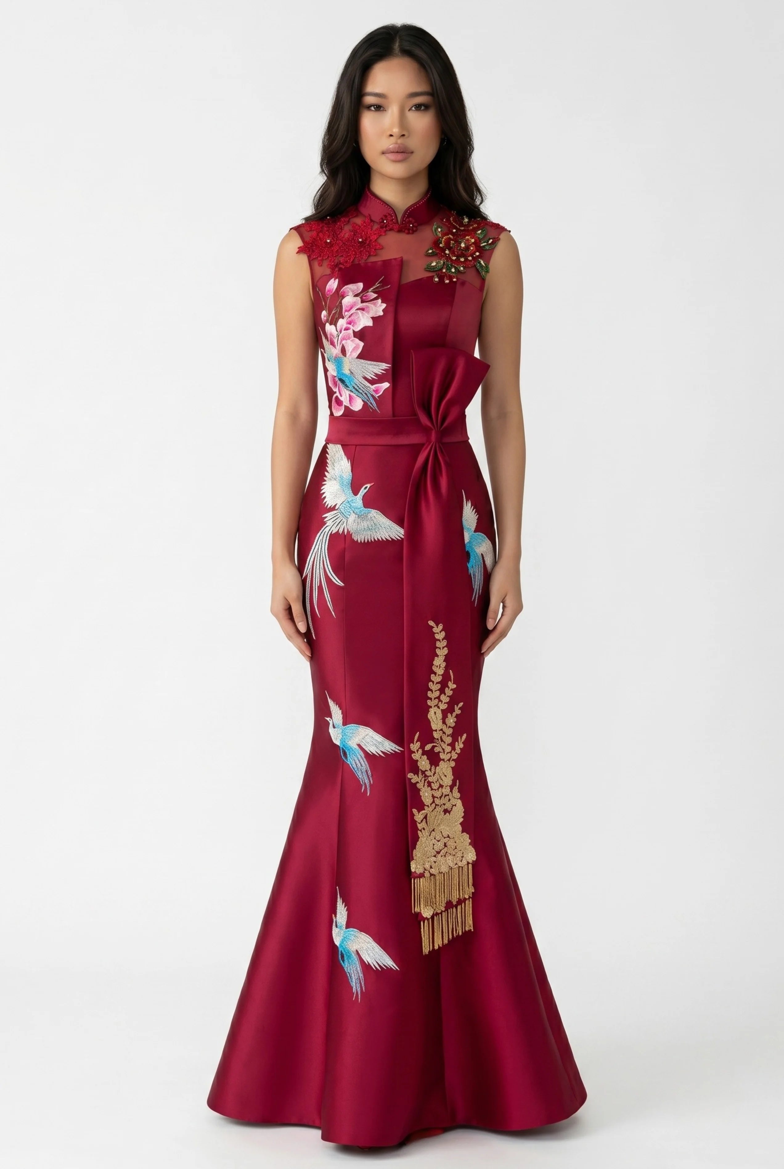 Front full-length view of a wine red satin mermaid qipao gown featuring crane embroidery and an oversized waist bow