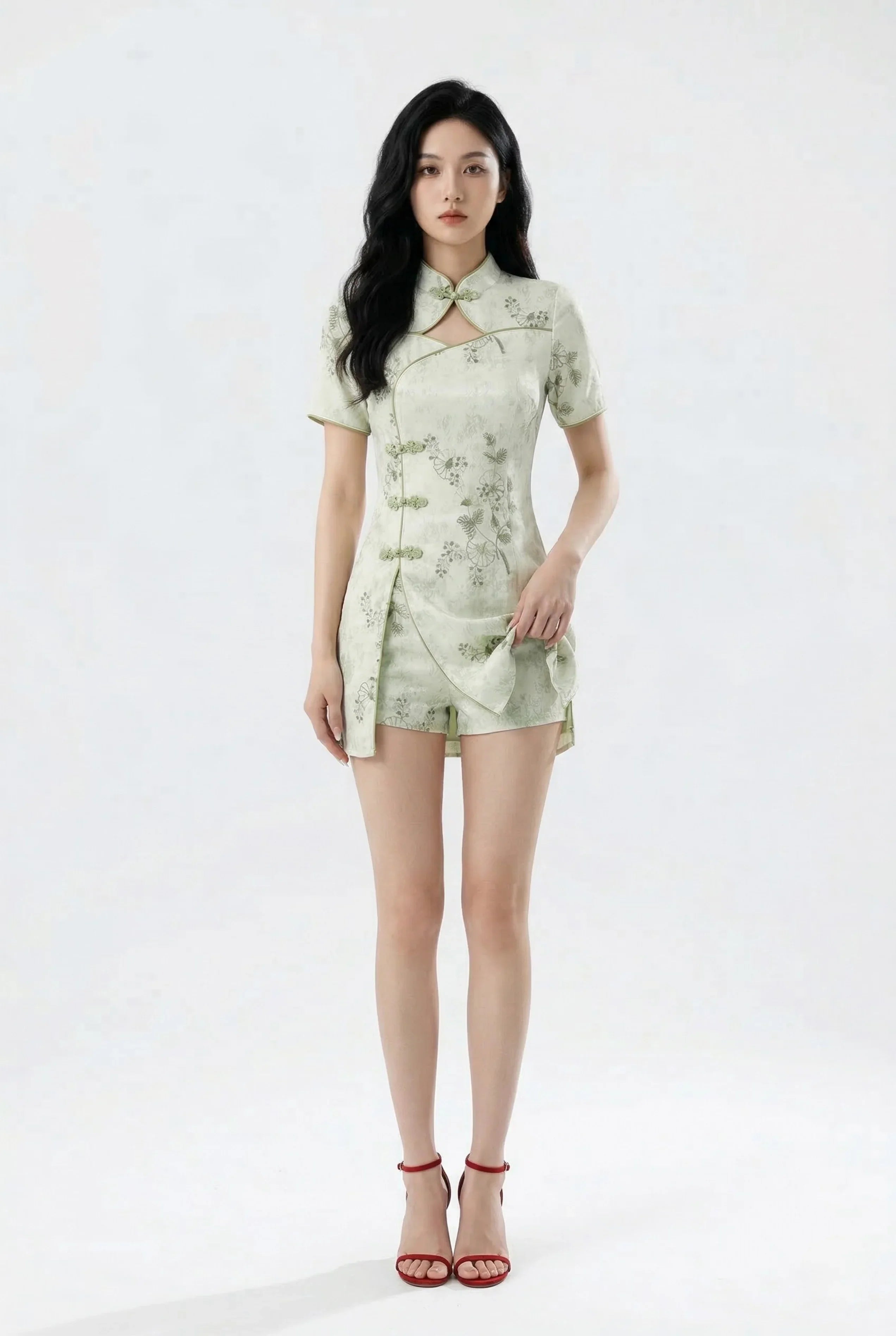 Full body view of a mini Chinese floral pattern dress and red heels.