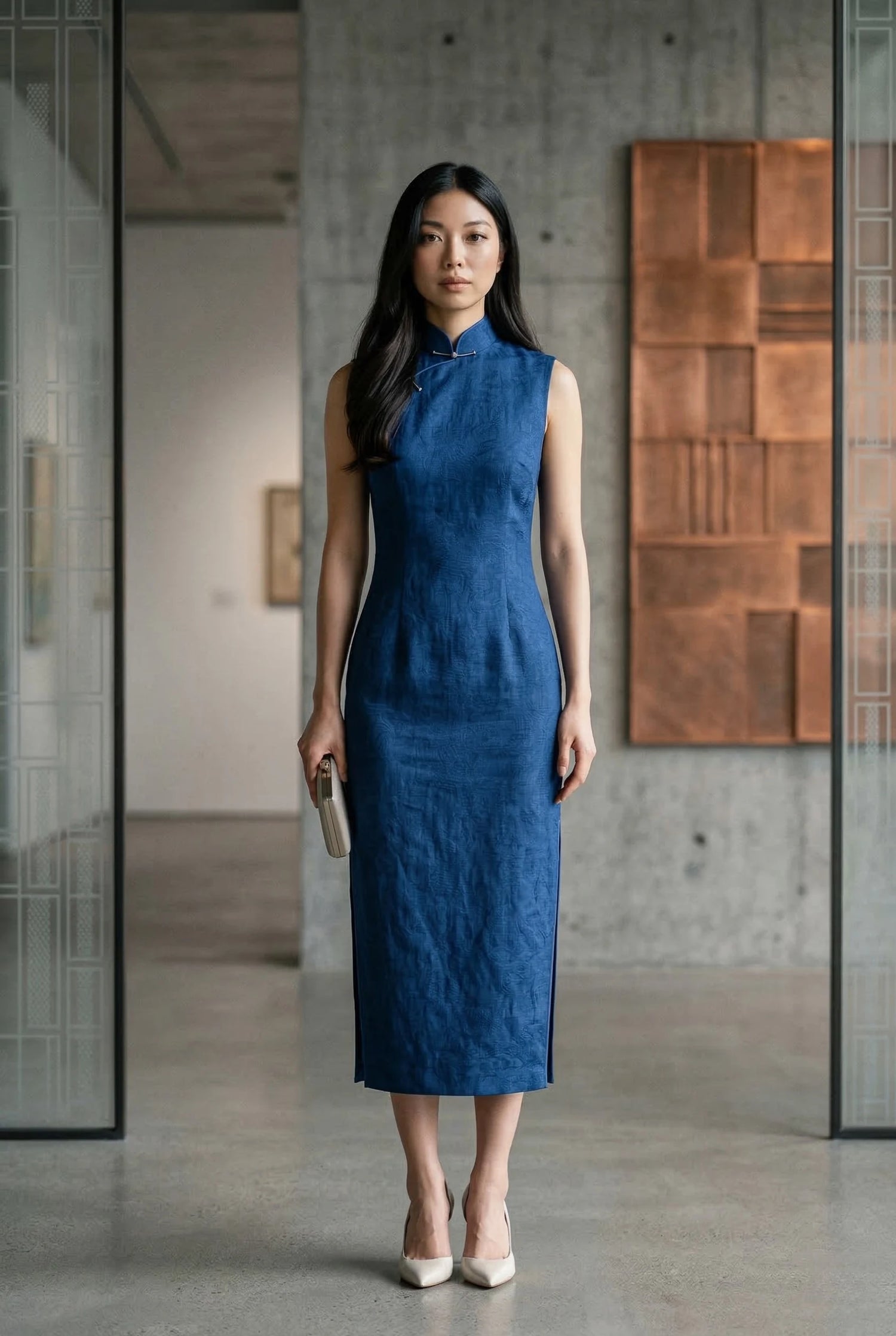 Sleeveless blue modern qipao by Maison Hua, featuring a sharp fit and breathable textile blend, presented in a contemporary gallery setting to illustrate an international lifestyle