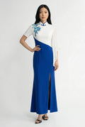 Modern asymmetrical blue and white qipao gown with embroidery and side slit