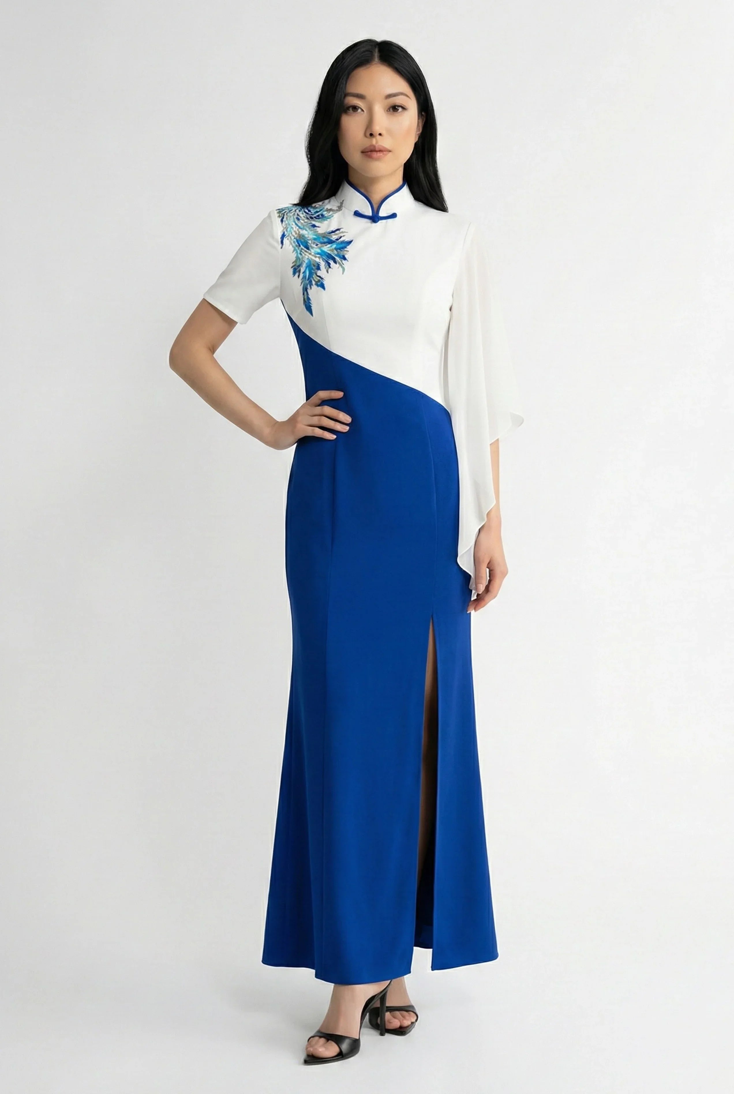 Modern asymmetrical blue and white qipao gown with embroidery and side slit