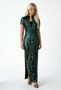 Full-length front view of a model wearing a modern dark green midi Qipao dress with blue and green floral patterns.