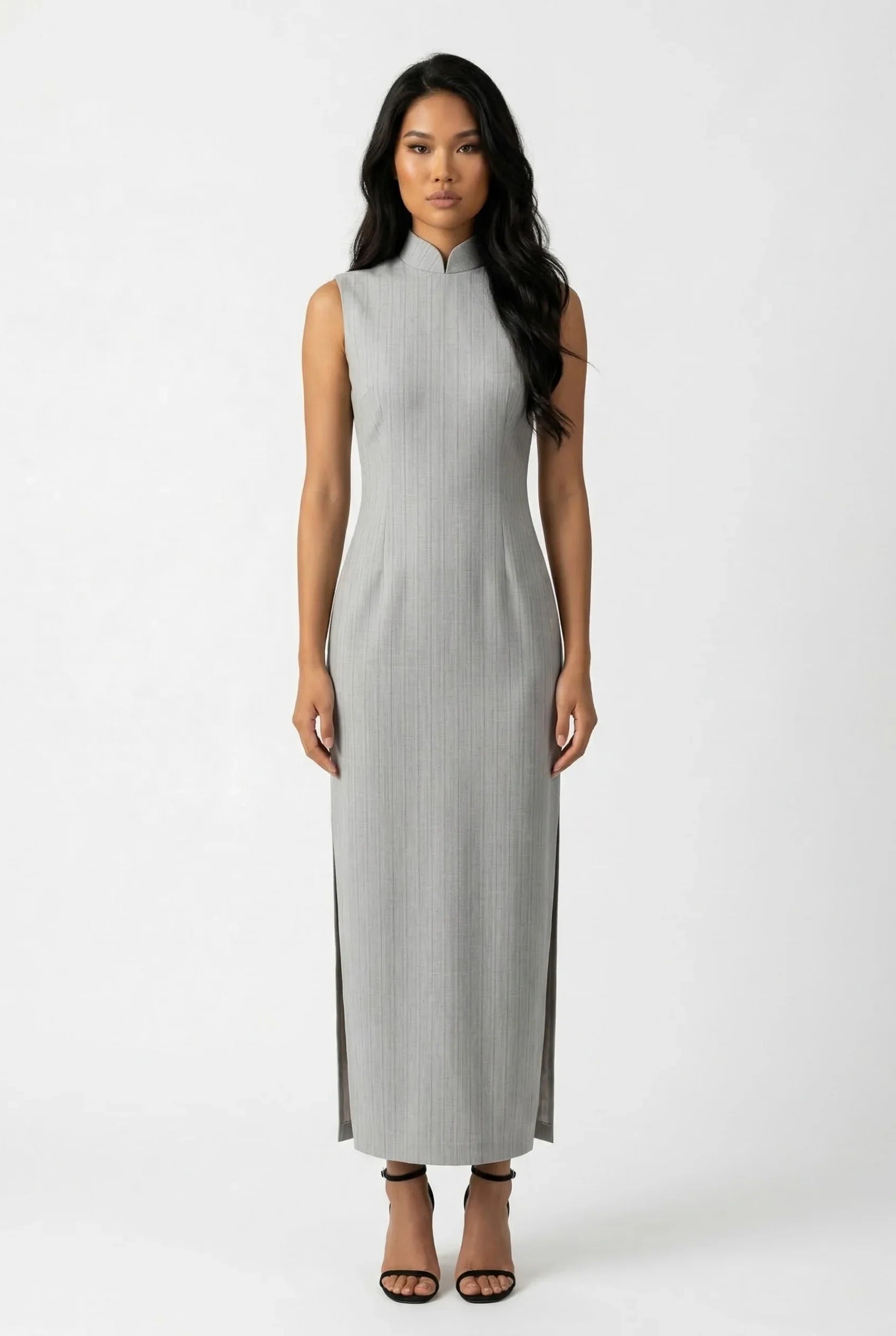 Full-length front view of a modern sleeveless grey Qipao dress with a minimalist textured fabric and side slits.