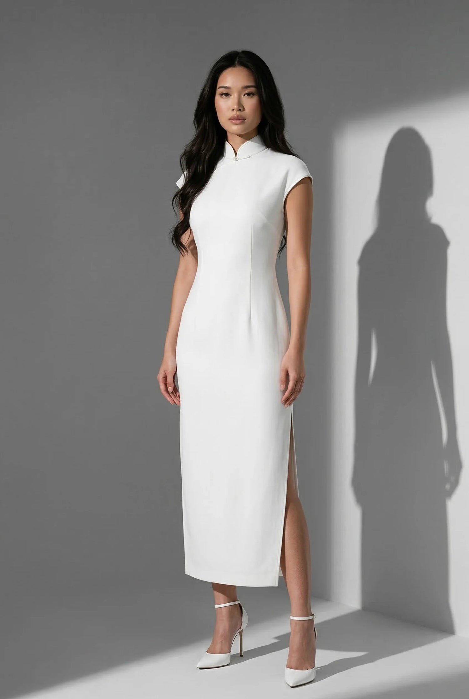Minimalist white Chinese qipao dress with a sophisticated silhouette and Mandarin collar, made from high-grammage fabric for perfect opacity