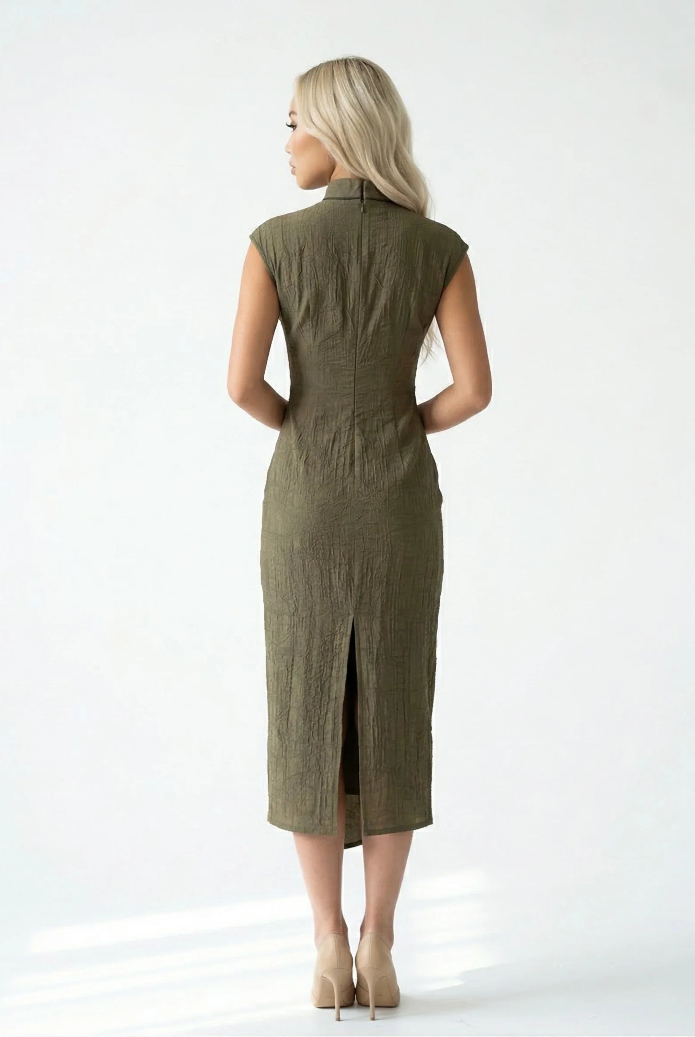 Back view of a form-fitting olive green midi Cheongsam dress showing the sophisticated silhouette and back slit.