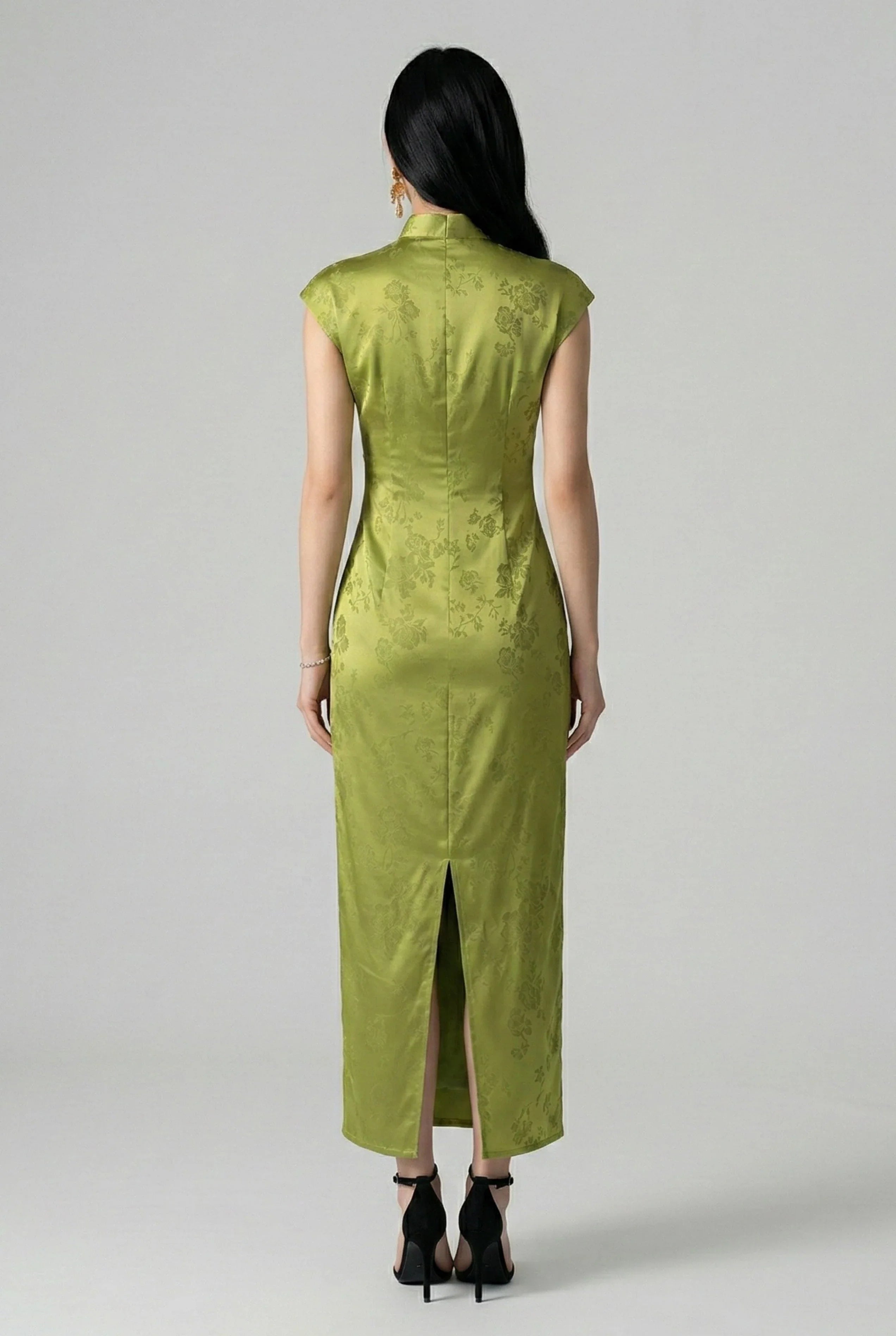 Fitted back view of a midi-length olive green silk cheongsam