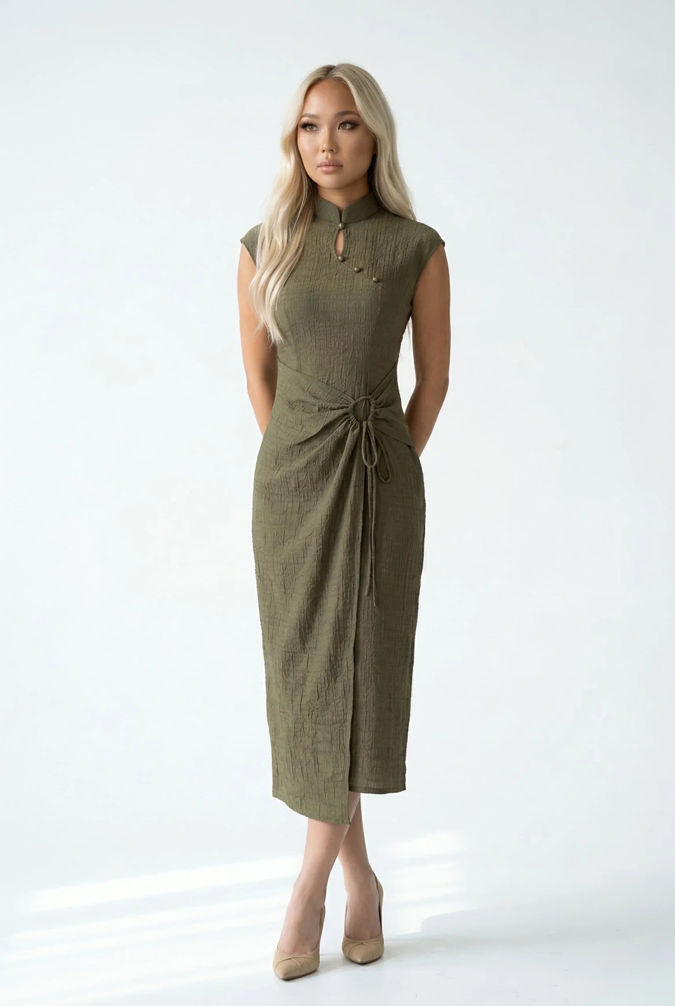 Full-length front view of a modern olive green textured midi Qipao dress with cap sleeves and a keyhole neckline.