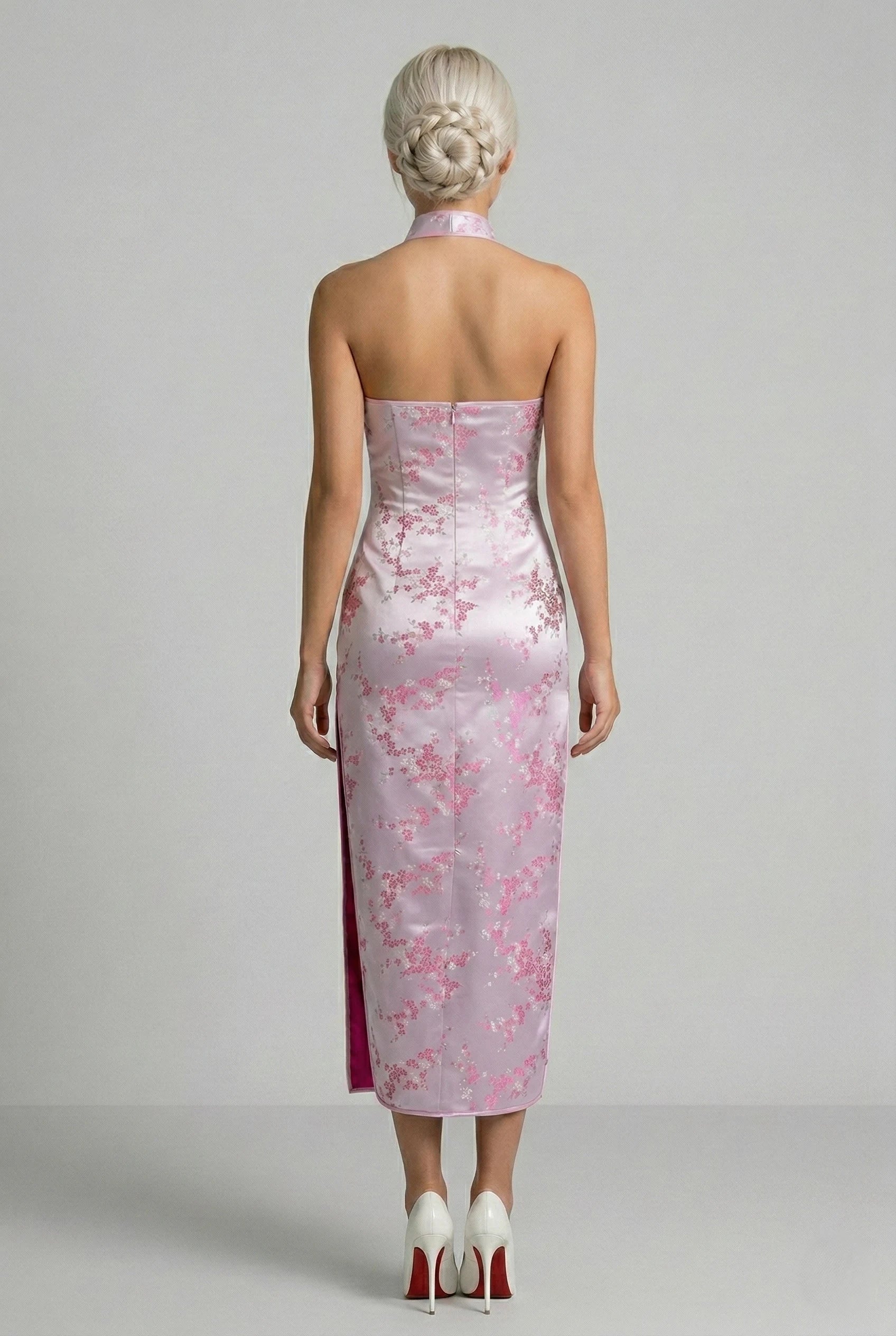 Maison Hua pink floral midi cheongsam showing its open back halter-neck design