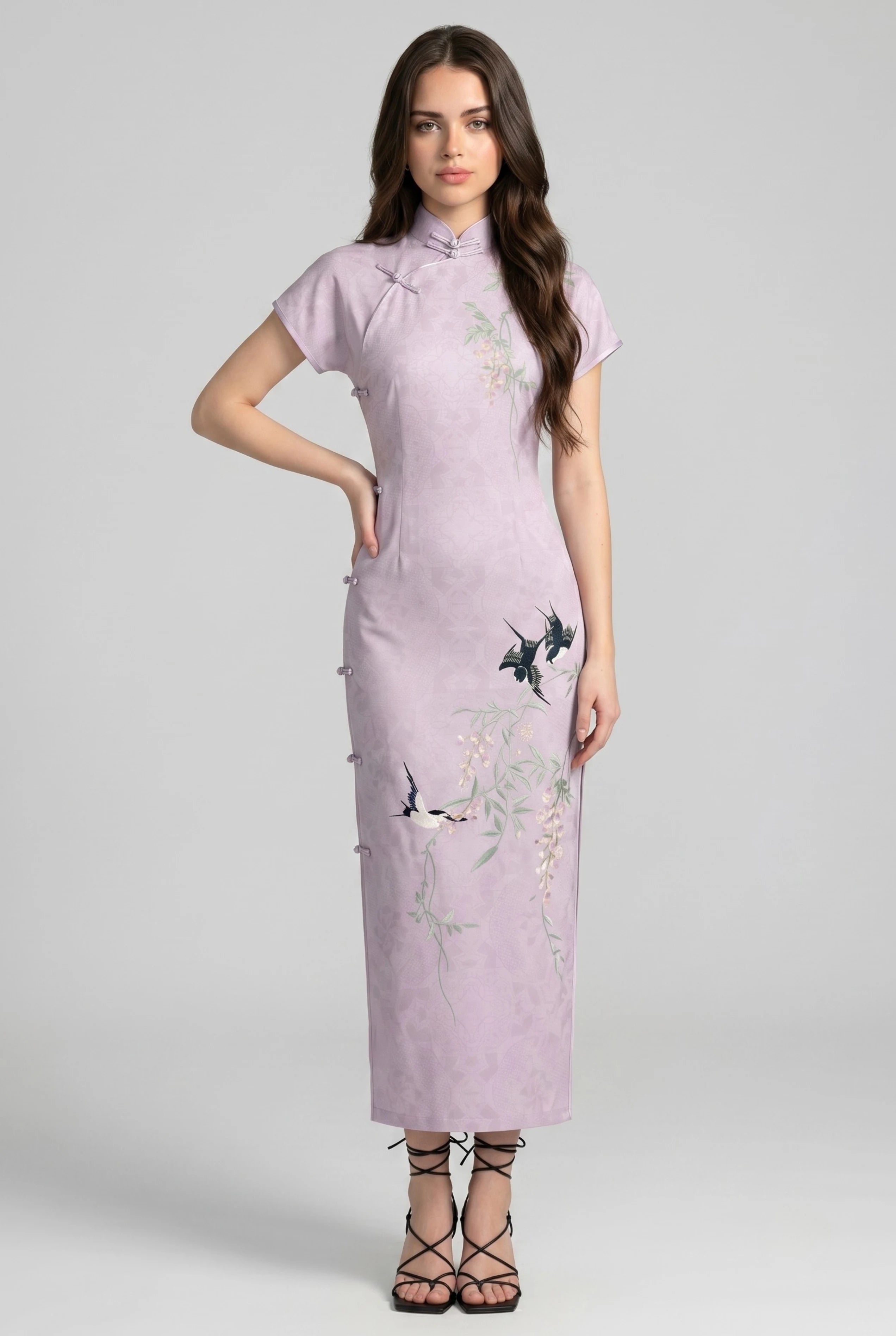 Front full-length view of a lavender purple Chinese style dress with cap sleeves, delicate bird embroidery, and black strappy heels