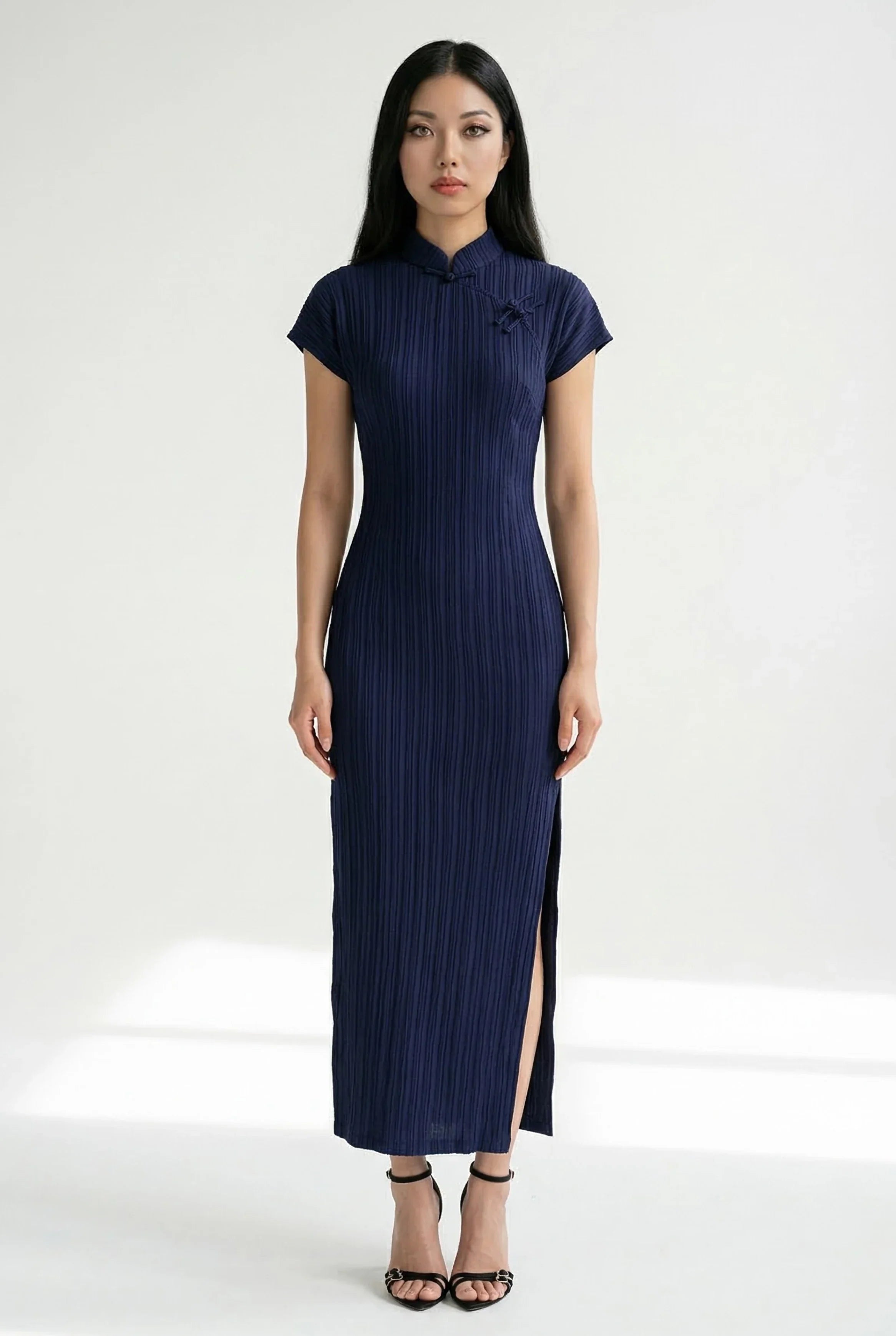 Full-length front view of an elegant purple halter-neck Qipao dress featuring a pearl-embellished collar.