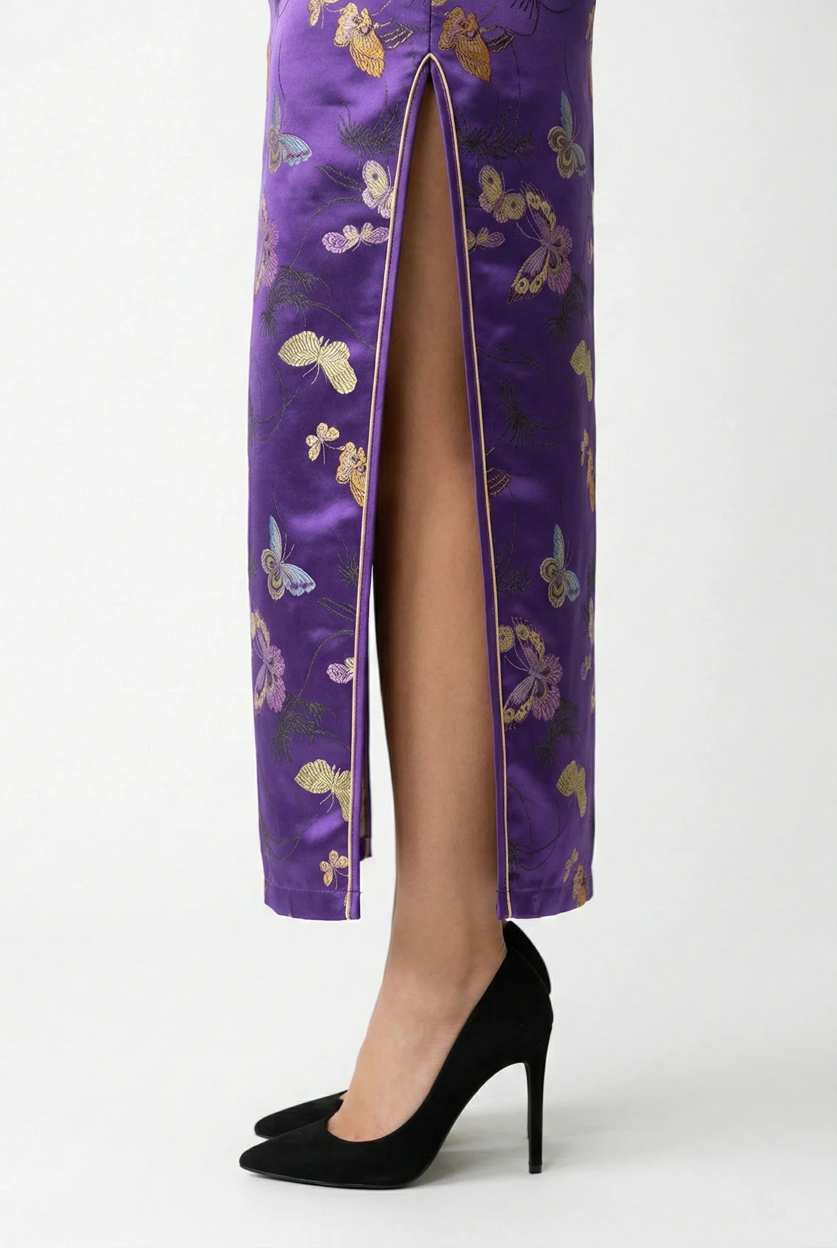Maison Hua purple qipao detail, side slit and butterfly motifs