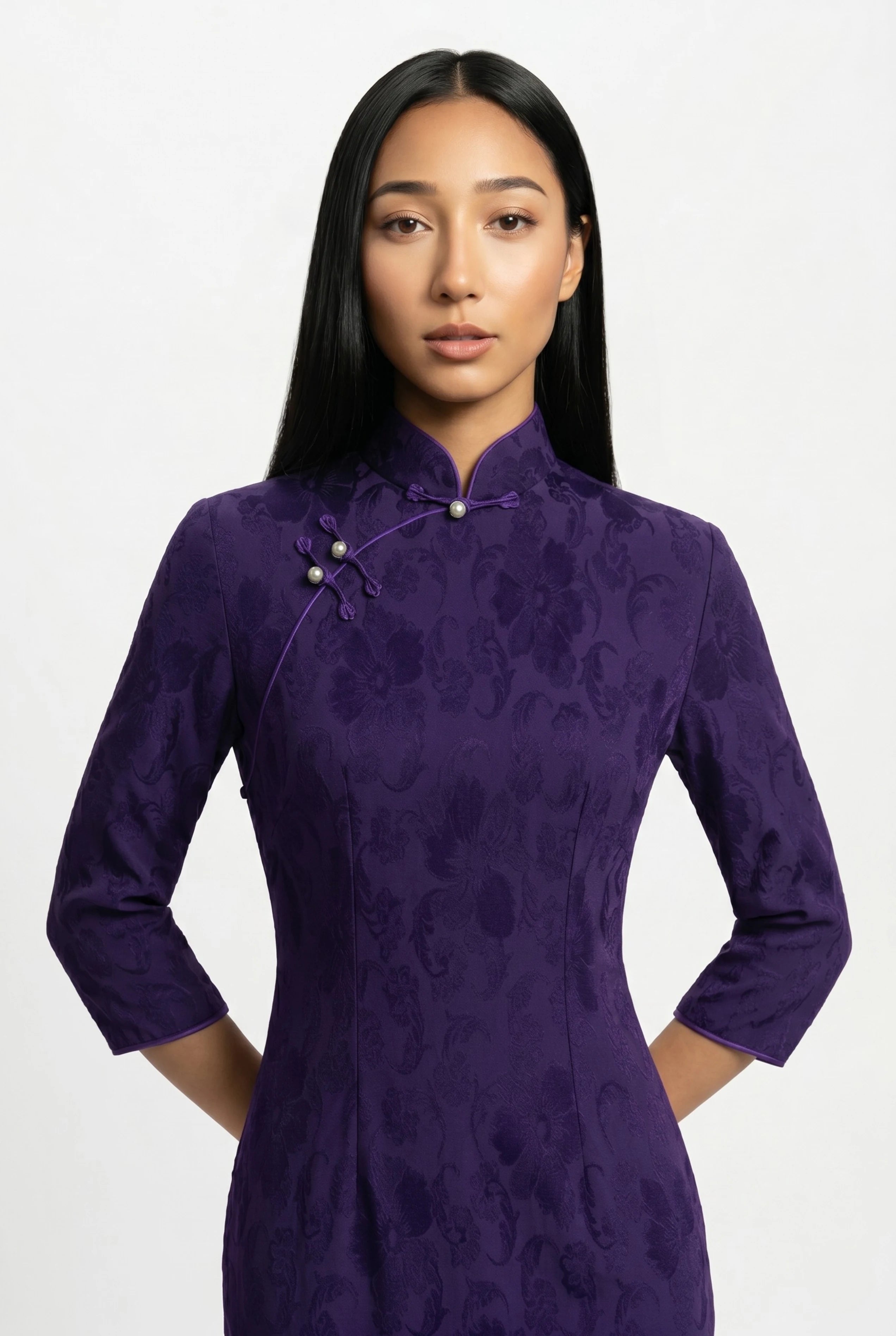 Close-up front view highlighting the mandarin collar, delicate frog button closure, and rich velvet texture
