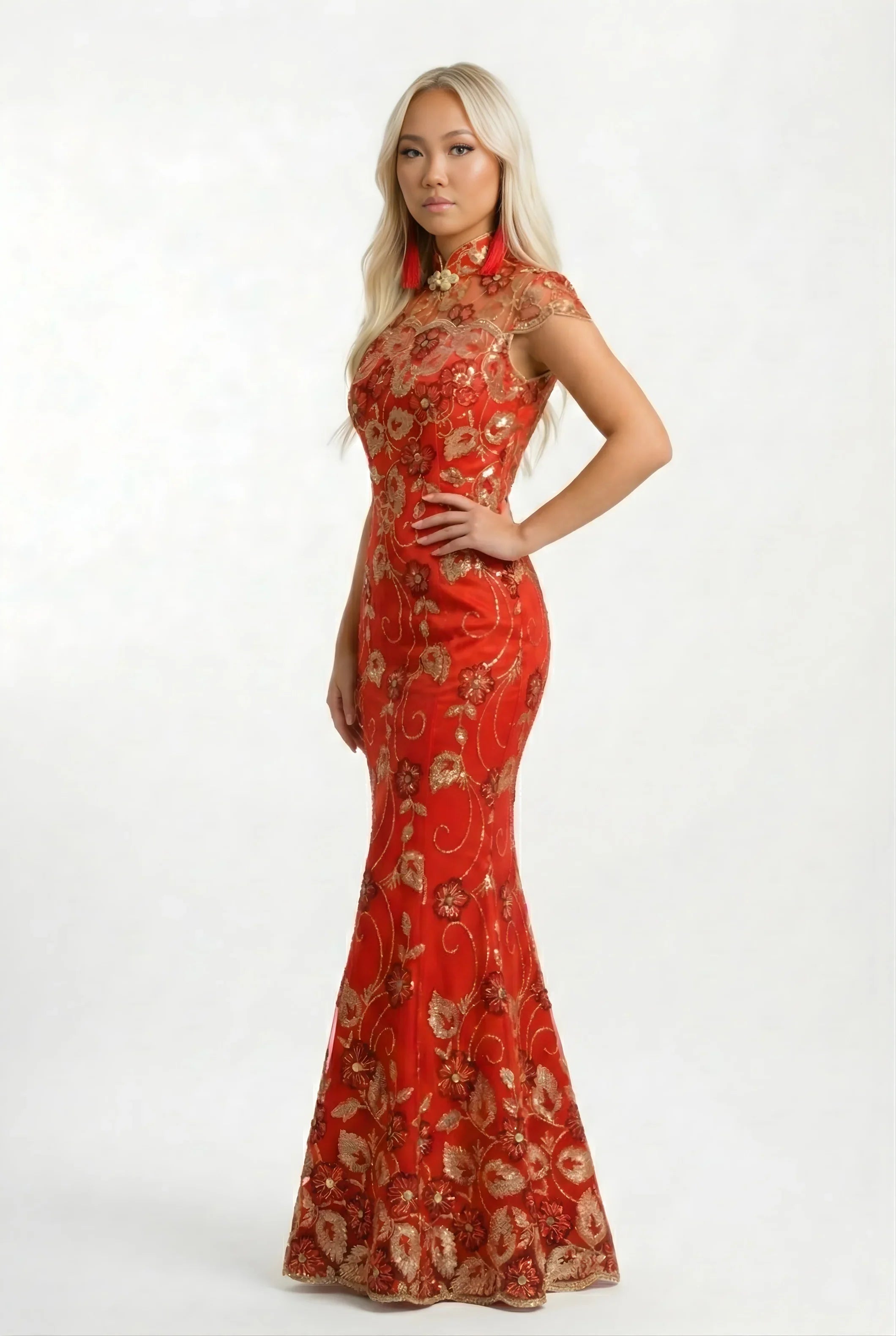 Side profile of a red and gold wedding cheongsam