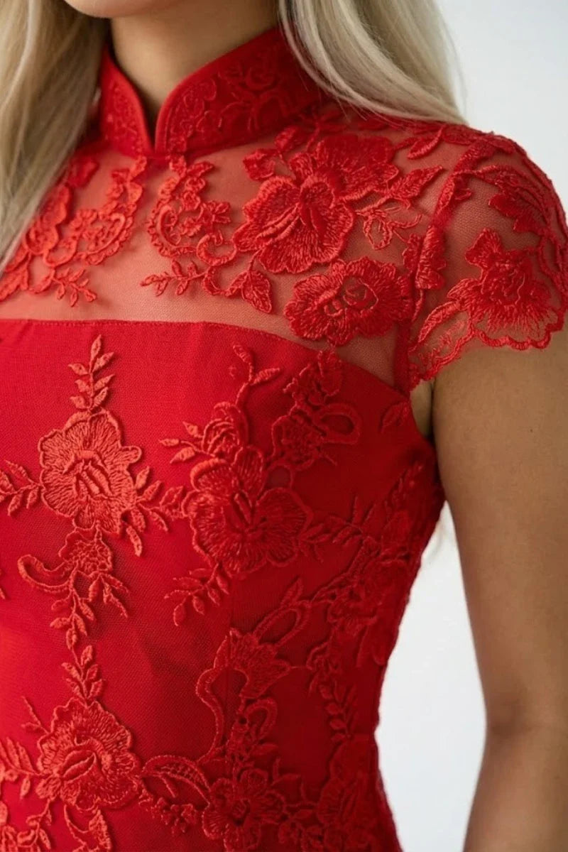 Detail of lace illusion neckline and mandarin collar on red qipao
