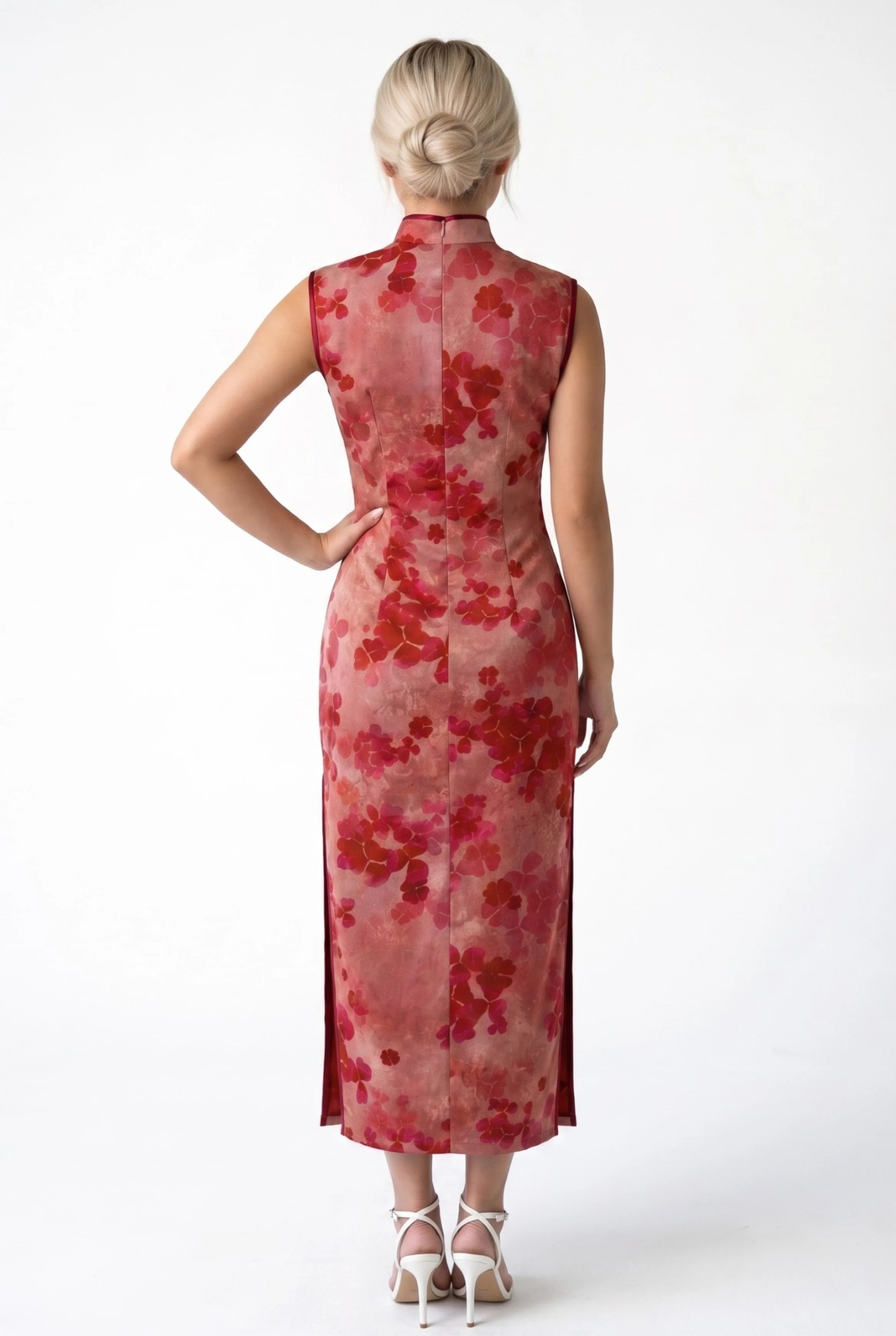 Back view of the sleeveless red cheongsam showing the elegant silhouette
