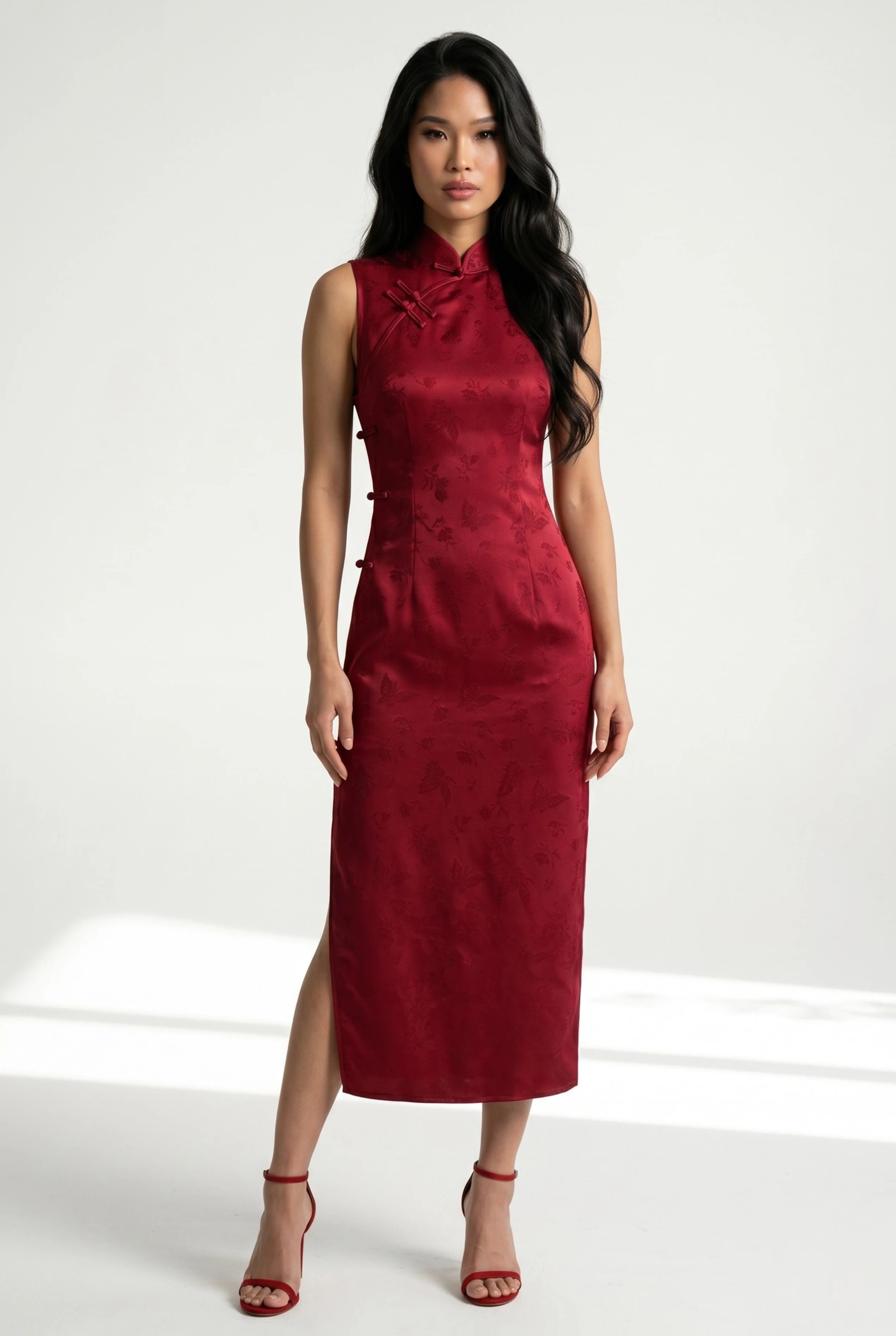 Front full-length view of a sleeveless red qipao dress with red high heels