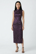 Front full-length view of a sleeveless solid purple qipao dress with a tonal floral jacquard pattern and black heels