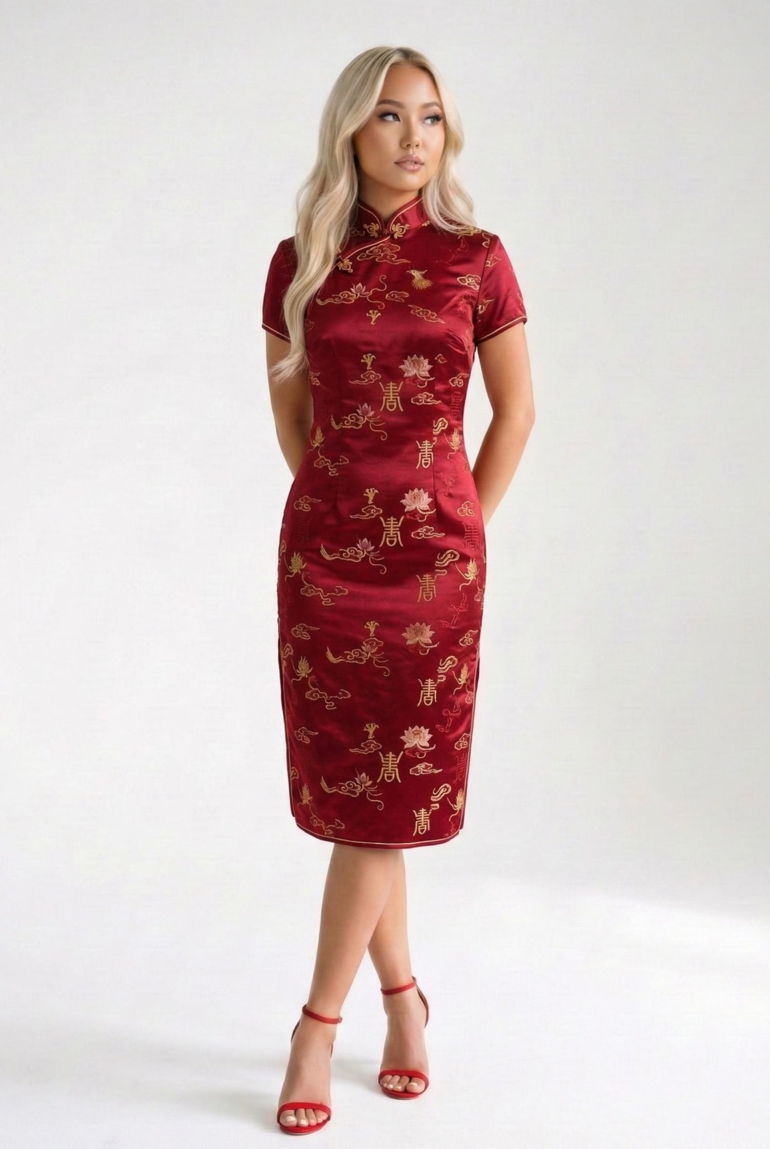 Traditional red Chinese qipao dress in high-density silk and brocade showing a sharp professional silhouette