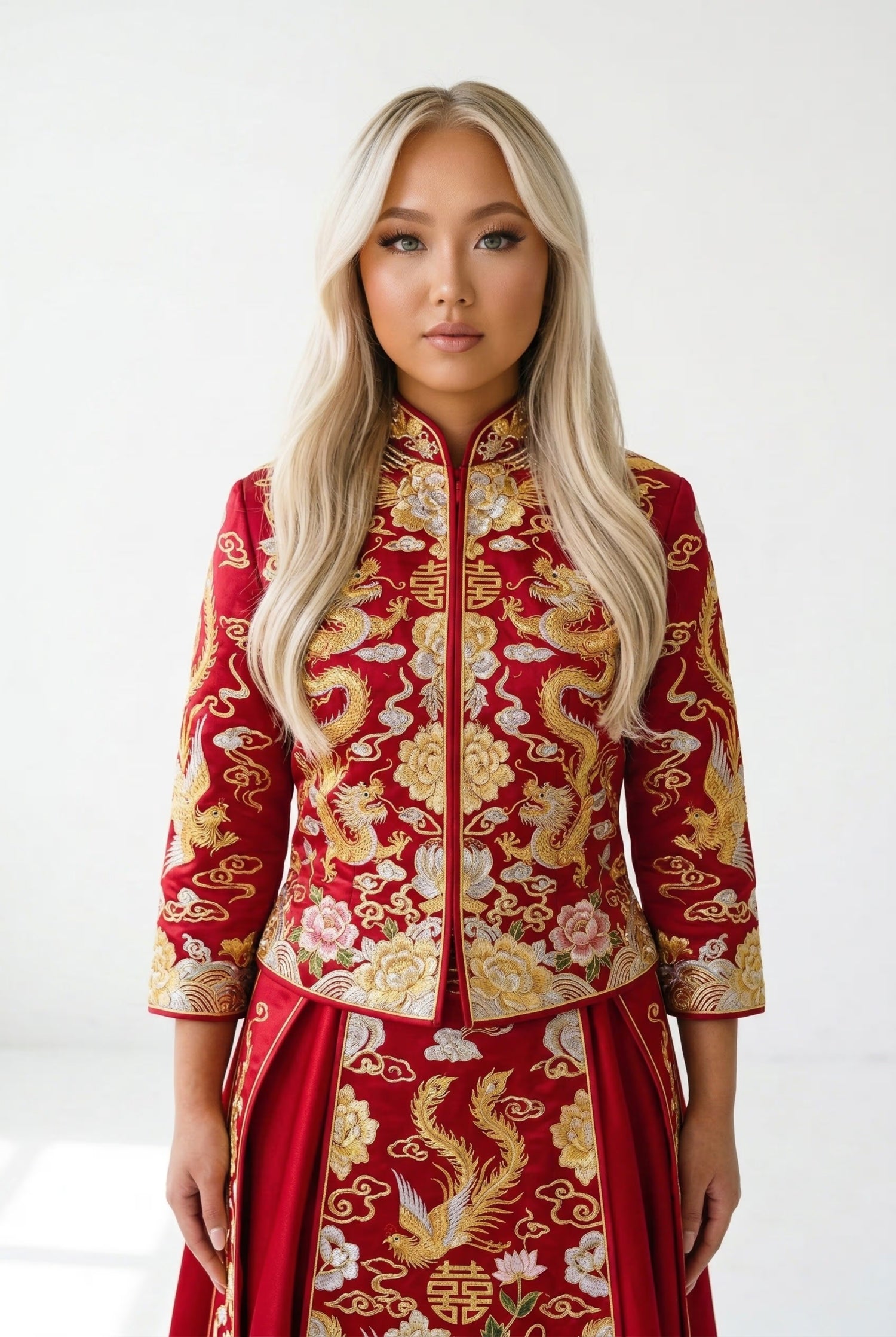 Traditional red Chinese wedding dress with detailed gold embroidery and Pankou buttons