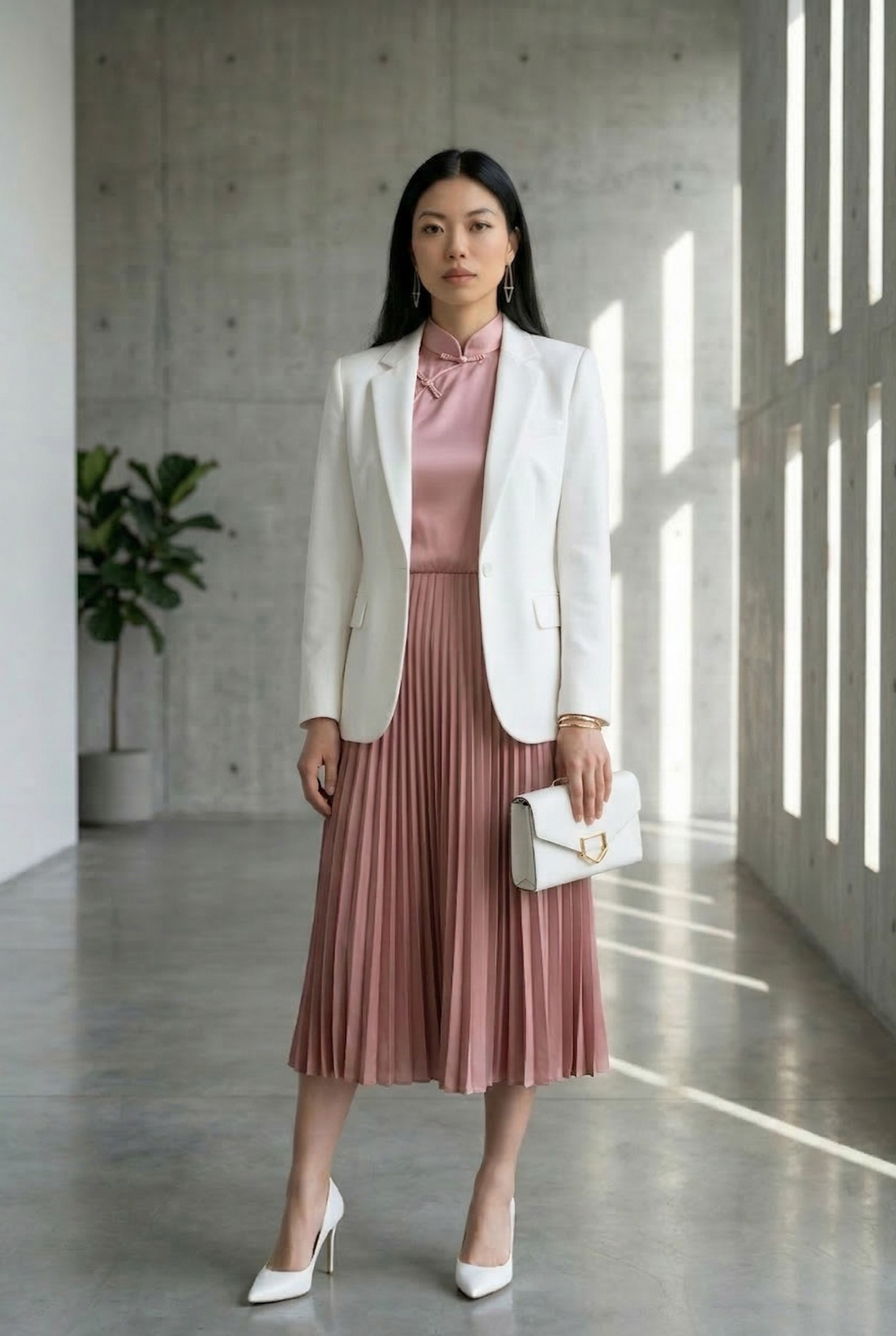 Modern pink cheongsam featuring an upright Mandarin collar, styled with a white blazer and pleated skirt for a versatile contemporary look