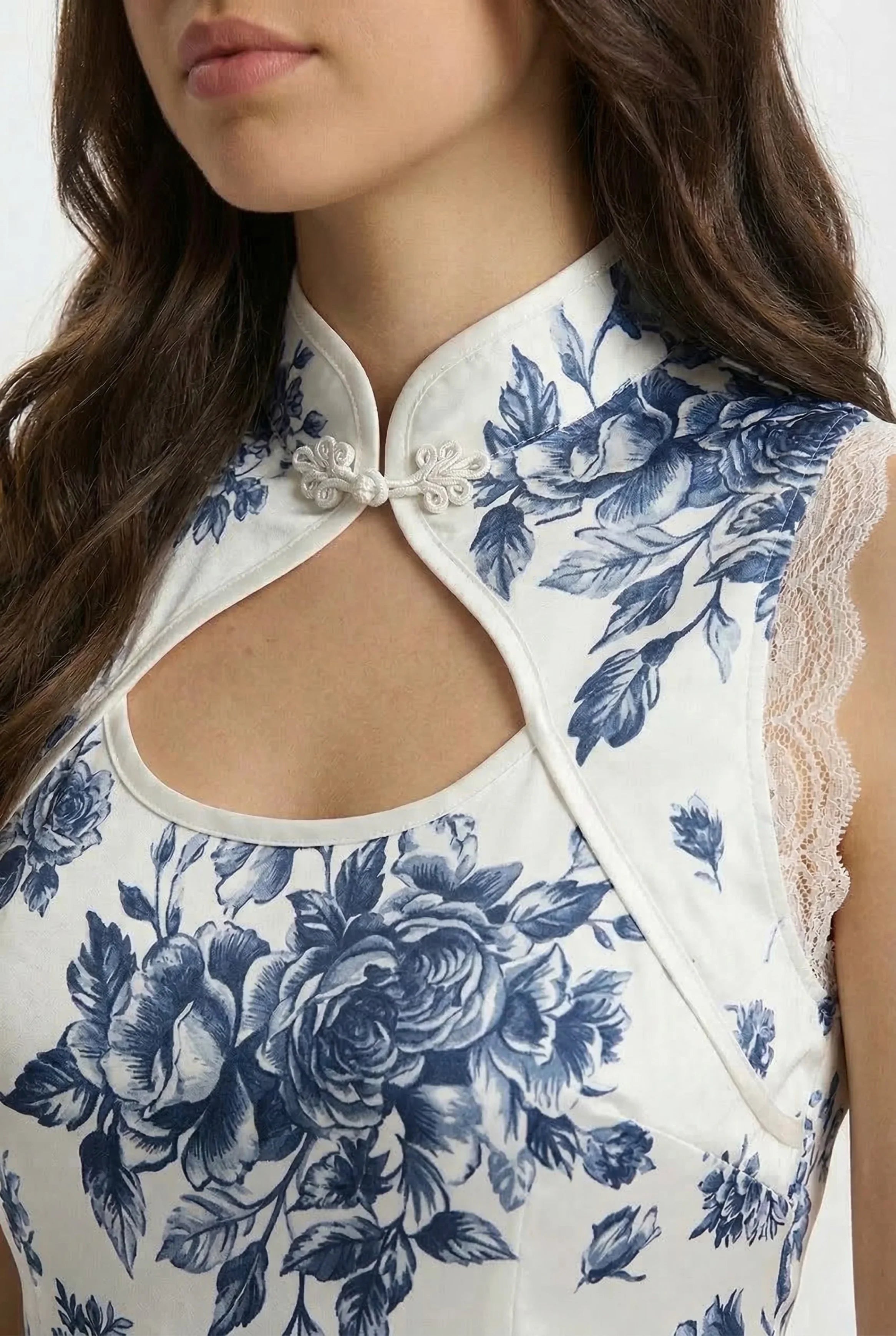 Detailed close-up focusing on the high-sheer, voluminous, pleated purple-blue sleeves of the modern Qipao, showing how they create a dramatic effect.